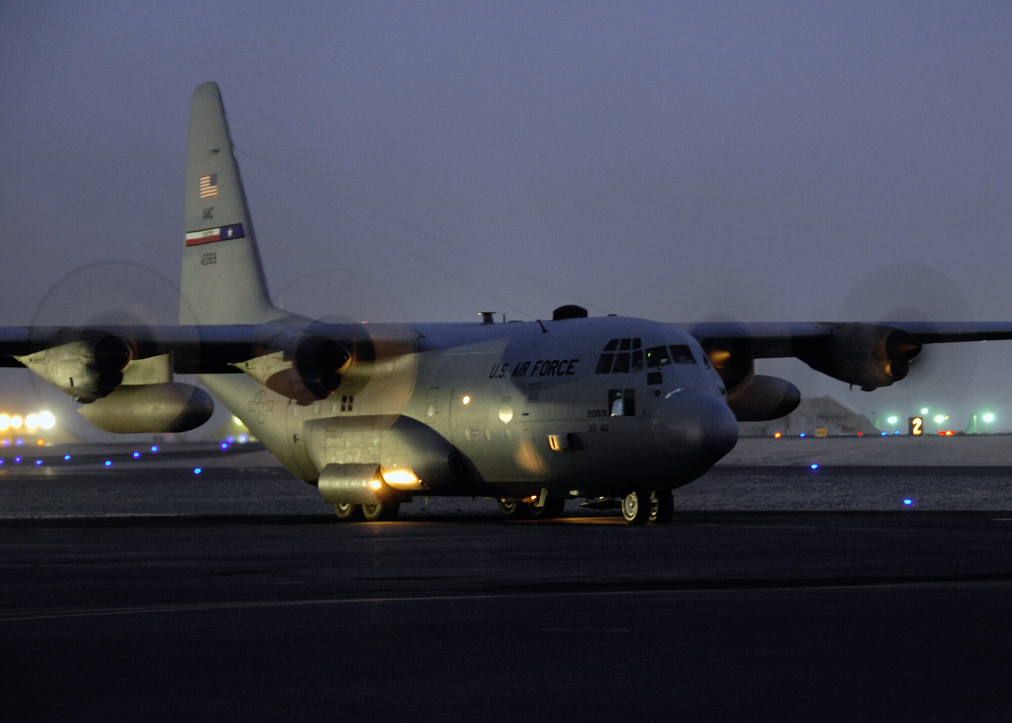 A C-130 Hercules, assigned to a base in Southwest Asia, prepares to depart on a sortie to Iraq. The C-130 provides intra-theater heavy airlift, delivering tons of cargo and transporting passengers to include troop resupply in support of Operations Iraqi and Enduring Freedom. (U.S. Air Force photo/Tech. Sgt. Raheem Moore)