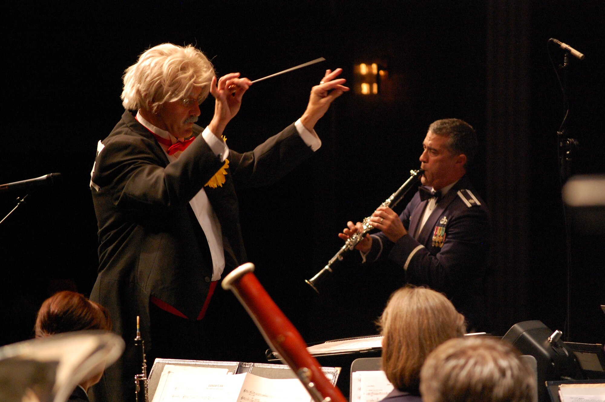 Maestro Hil Arioso conducts the Concert Band with soloist Lt Col Doug Monroe