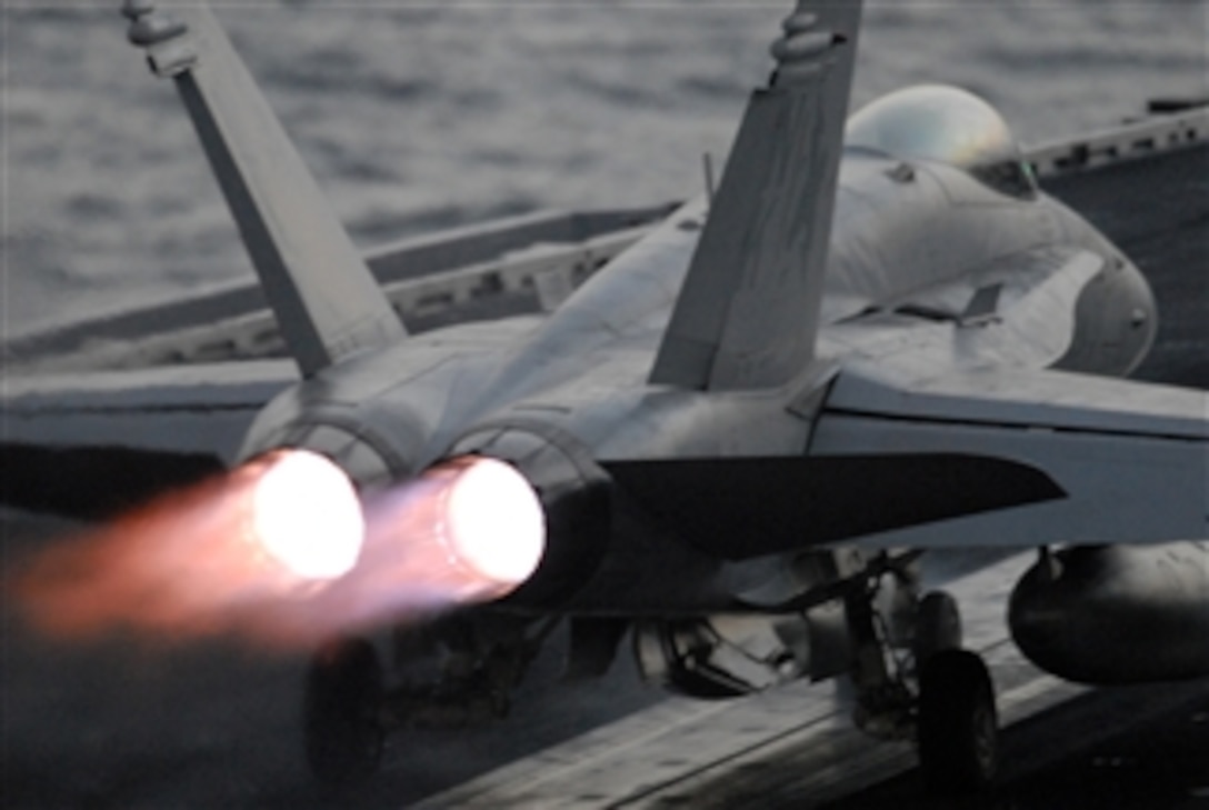 An F/A-18C Hornet aircraft assigned to Strike Fighter Squadron 25 takes off from the flight deck of the aircraft carrier USS Ronald Reagan (CVN 76) on Oct. 8, 2008.  The Reagan is deployed to the 5th Fleet area of responsibility.  