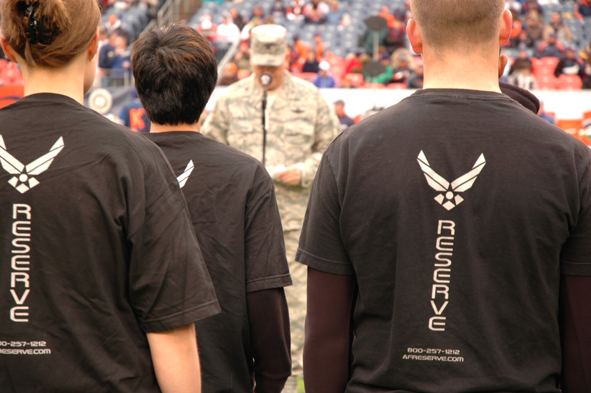 More than 75,000 Denver Bronco football fans experienced more than just the usual pre-game festivities during the October 12, 2008 home game against the Jacksonville Jaguars at Invesco Field at Mile High in Denver, Colo. The fans became honorary witnesses to the Air Force Reserve’s mass enlistment ceremony of its newest Citizen Airmen. (U.S. Air Force photo/ Tech. Sgt. Daniel Butterfield)