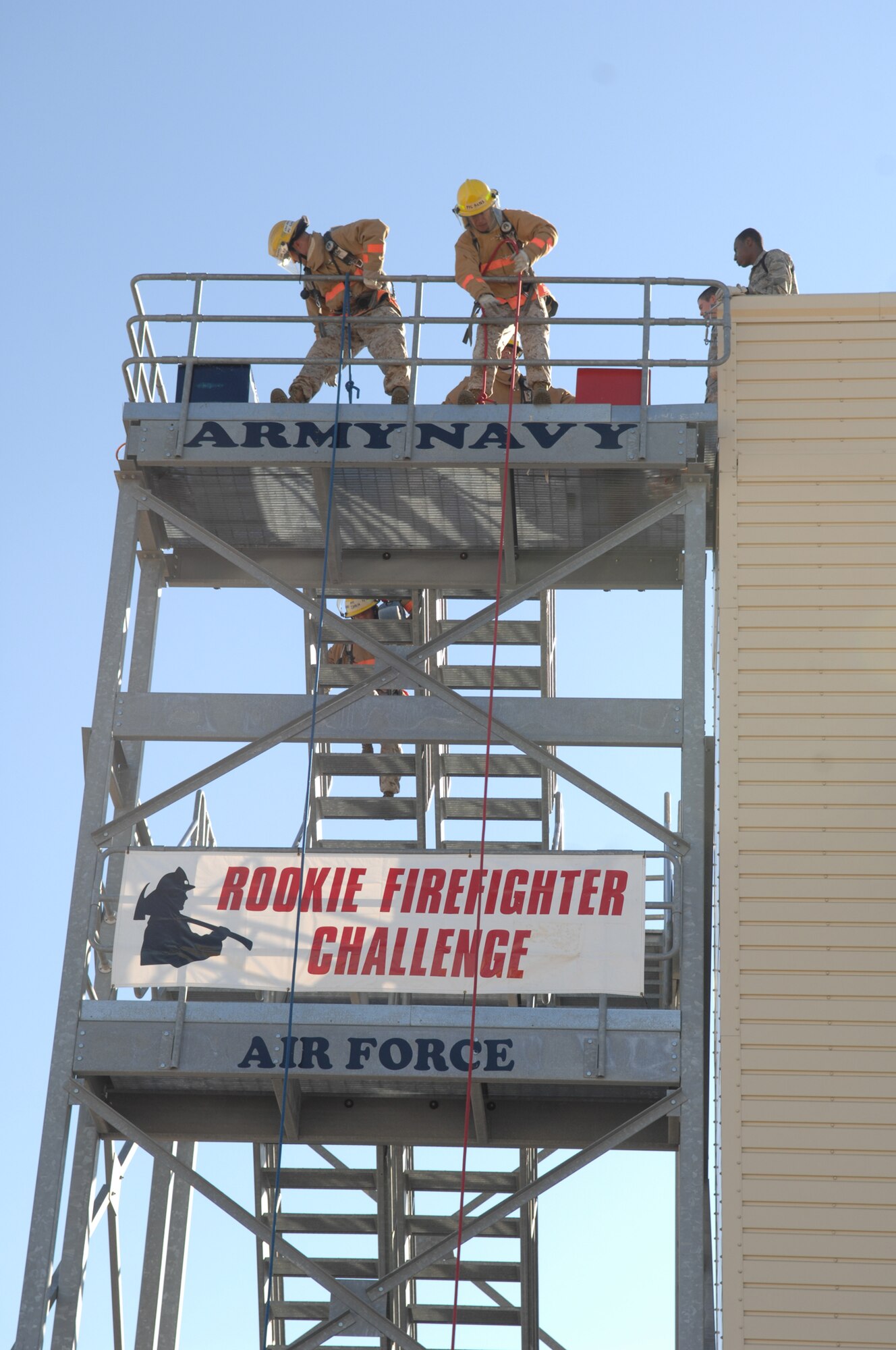 Hauling a 175-pound dummy more than 50 feet is the final part of the 2008 Rookie Firefighter Challenge at Goodfellow Air Force Base Oct. 25. The challenge is often called often called “the toughest two minutes in sports.” (U.S. Air Force photo by Tech. Sgt. John Barton)