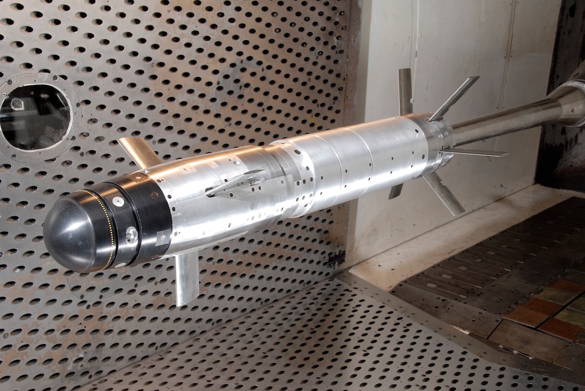 The Army’s Mid-Range Munition model during aerodynamic testing in Arnold Development Center’s four-foot transonic wind tunnel. (Photo by Rick Goodfriend)