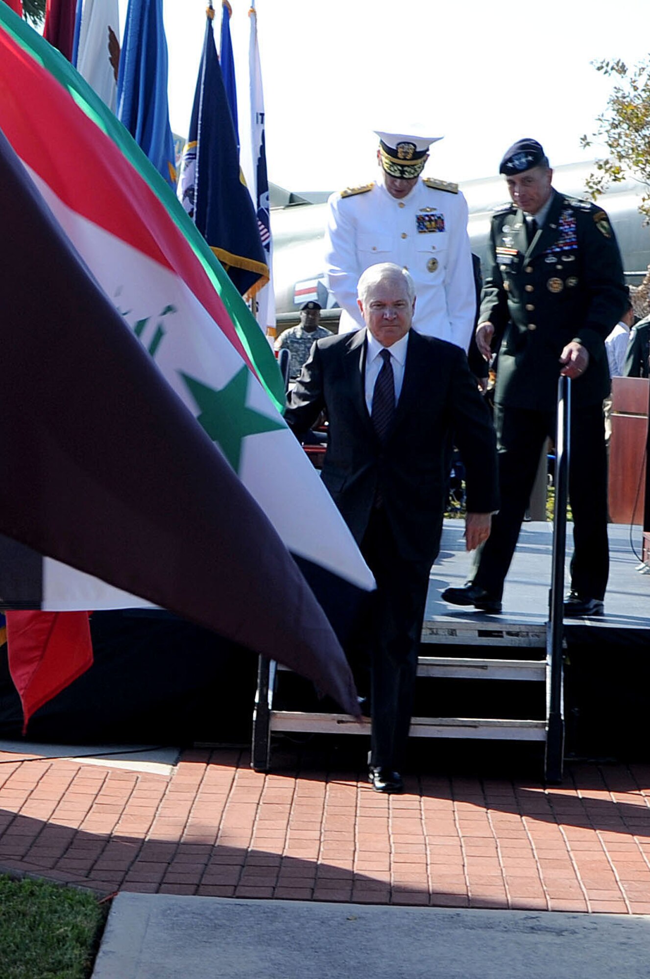 U.S. Defense Secretary Dr. Robert M. Gates exits the stage after the U.S. Central Command (USCENTCOM) Change of Command Ceremony here at MacDill AFB, FL. During the Ceremony Gen. David H. Petraeus assumed command of USCENTCOM from U.S. Army Lieutenant Gen. Martin E. Dempsey.

(U.S. Air Force Photo by Air Force SSgt Joseph L. Swafford Jr.)
