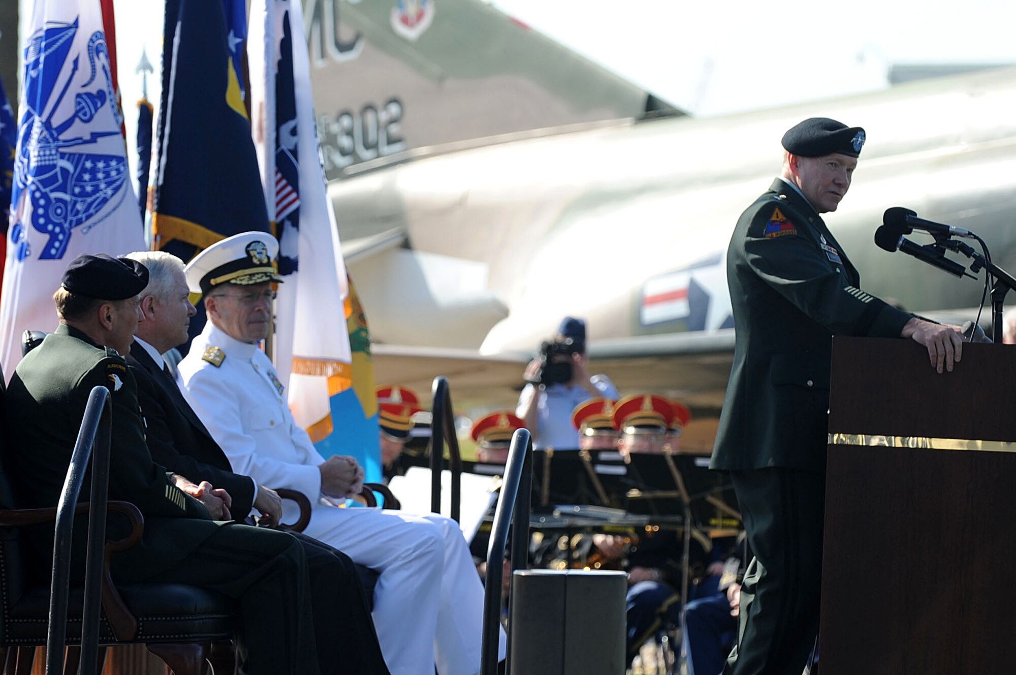 U.S. Army Lt. Gen. Martin E. Dempsey speaks while U.S. Army Gen. David H. Petraeus, Defense Secretary Dr. Robert M. Gates, and U.S. Navy Admiral Mike Mullen look on during the U.S. Central Command (USCENTCOM) Change of Command Ceremony here at MacDill AFB, FL. During the Ceremony Gen. David H. Petraeus assumed command of USCENTCOM from U.S. Army Lt. Gen. Martin E. Dempsey.

(U.S. Air Force Photo by Air Force SSgt Joseph L. Swafford Jr.)
