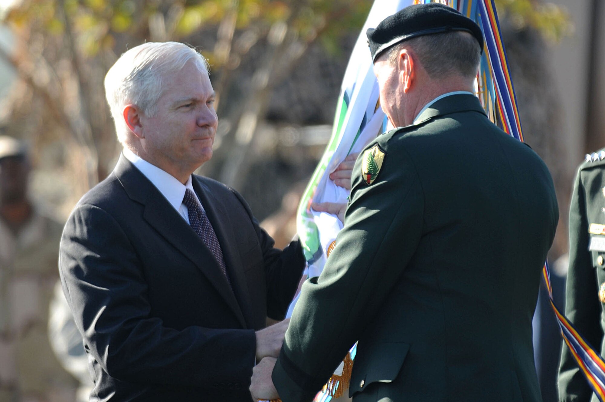 U.S. Army Gen. David H. Petraeus accepts the U. S. Central Command flag from Defense Secretary Dr. Robert M. Gates. Gen. Petraeus assumed command from U.S. Army Lieutenant Gen. Martin E. Dempsey during an Oct 31st ceremony at MacDill AFB, Fla.  

(U.S. Air Force Photo by Air Force SSgt Joseph L. Swafford Jr.) 