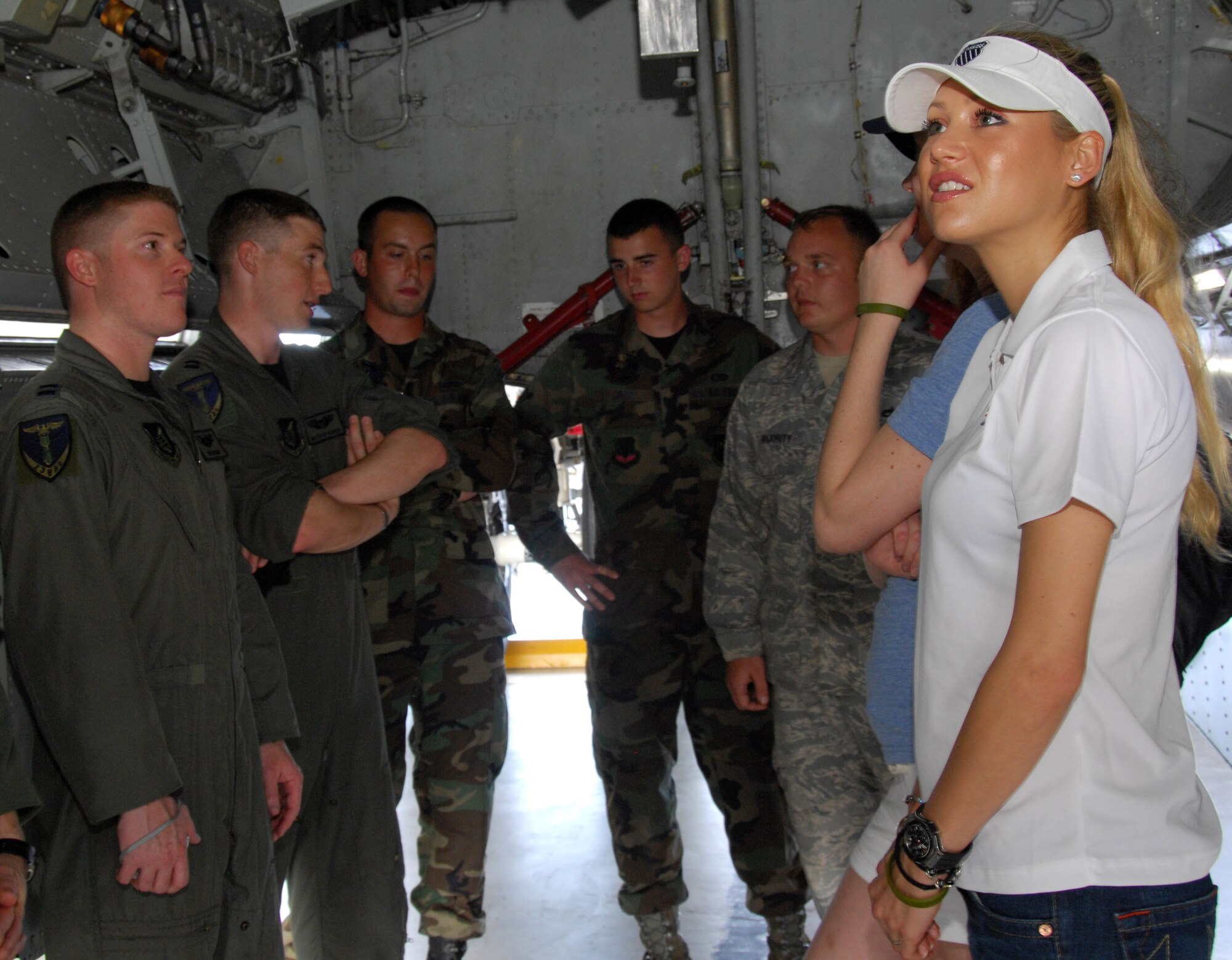 Anna Kournikova tours a B-52 Stratofortress as members of the 23d Expeditionary Bomb Squadron explain the aircraft's capabilities Oct. 29 at Hangar 1 at Andersen Air Force Base, Guam. Members of the 23rd EBS are deployed to Guam from Minot AFB, N.D. (U.S. Air Force photo/Airman 1st Class Nichelle Griffiths)