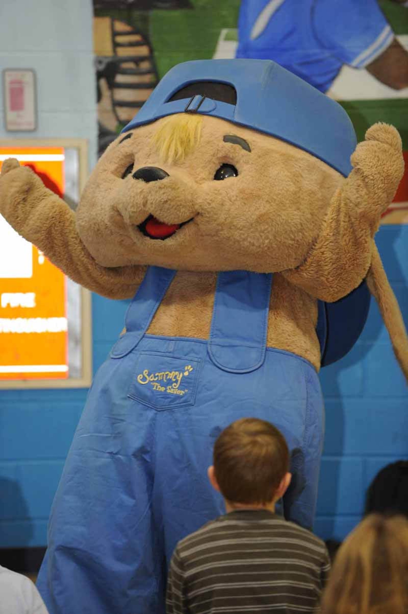 Sammy Rabbit, main character in the book by Sam Renick, "It's A Habit, Sammy Rabbit!" visits with Ellsworth children about financial responsibility here, Oct. 30. Mr. Renick sang songs, told stories and discussed the importance of saving money. (U.S. Air Force photo/Airman 1st Class Adam Grant)
