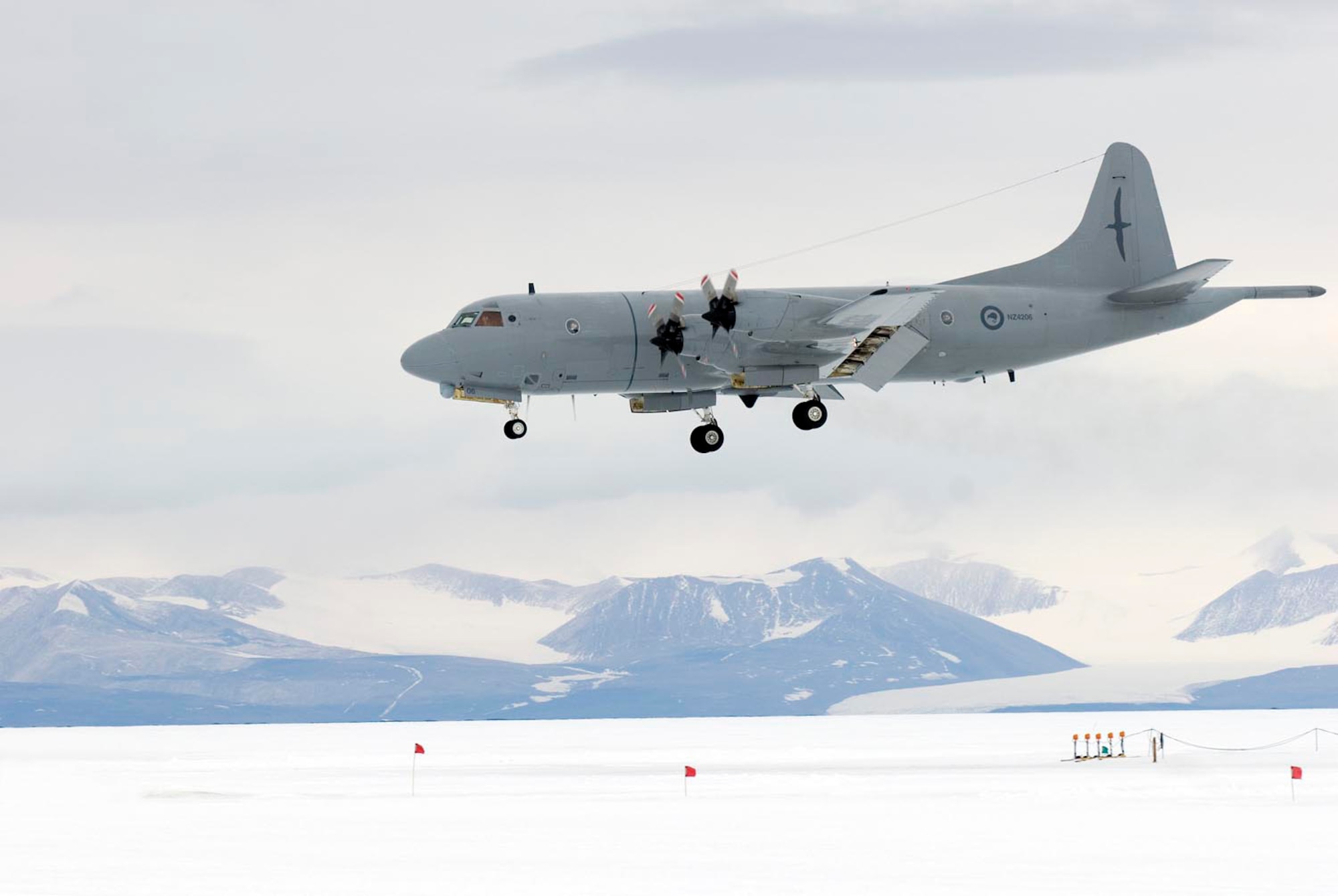 A Royal New Zealand Air Force P3-Orion lands on the ice runway at McMurdo Station, Antarctica.  (Royal New Zealand Air Force photo)


