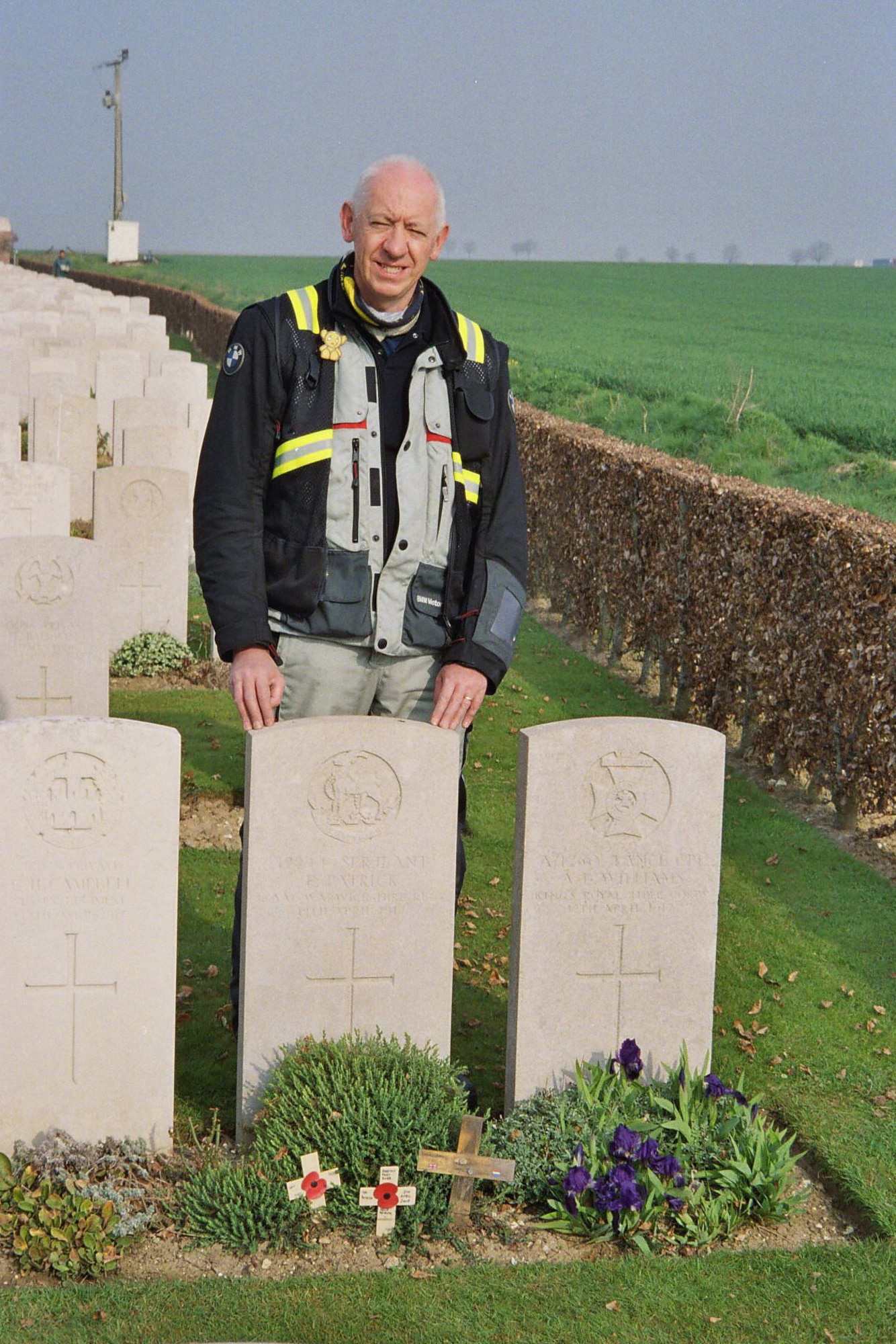 My brother, Michael Davis at the grave of our great uncle, Felix Patrick, the day of the 90th anniversary of Felix Patrick’s death.Felix Patrick's grave is in Duisans Commonwealth War Graves cemetery, Arras, France. Two thirds of the men who died in Felix’s battalion have no known grave. (Photo by Michael Davis)