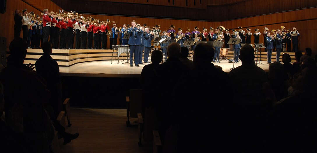 At the conclusion of 'Slides Across the Heartland,' the audience came to their feet once again as the USAF Heartland of America Band's Brass in Blue (center stage), Mr. Joseph Alessi (far left), and 76 high school and college trombonists played Meredith Willson's "76 Trombones."  This concert was presented on Monday, October 20, 2008 at the Holland Performing Arts Center in Omaha, NE.