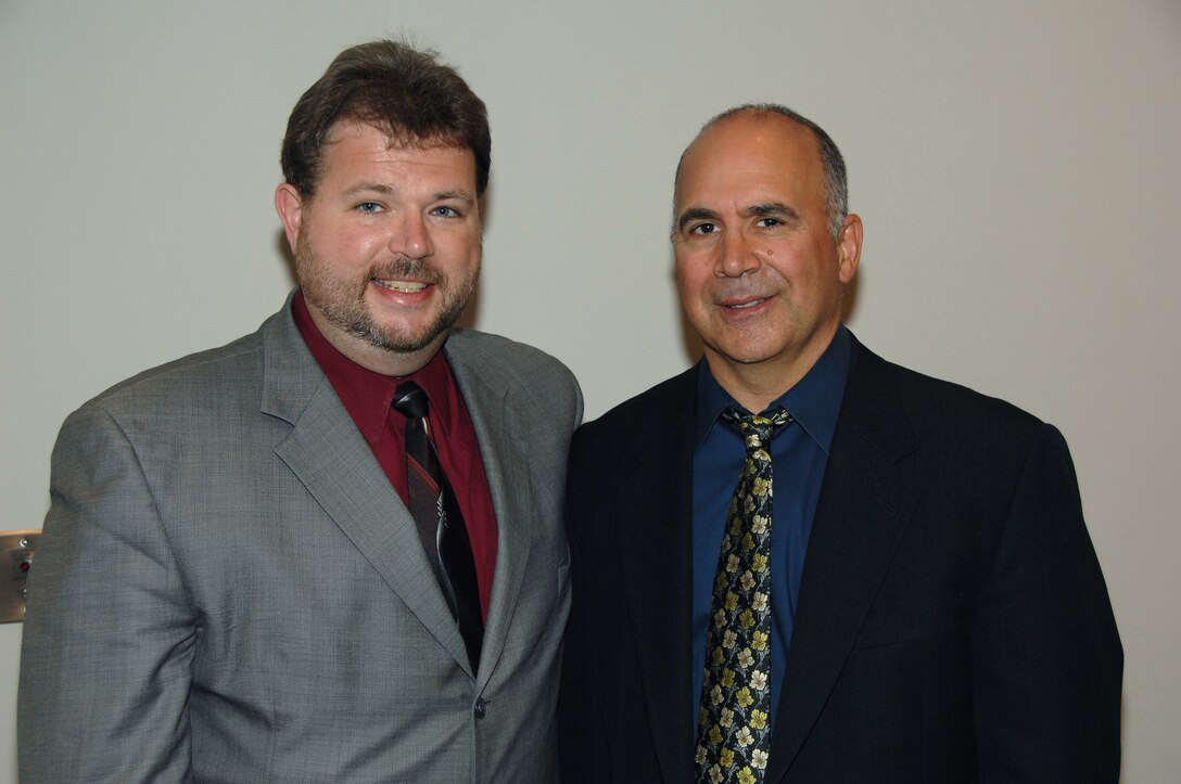 Mr. Joseph Alessi (left), took a moment to thank Nebraska composer, Dr. Eric Richards (right) for writing the trombone solo, "Three Scenes for American Trombone and Brass Orchestra," premiered on Monday, October 20, 2008 as part of 'Slides Across the Heartland' at the Holland Performing Arts Center.  Mr. Alessi is on the faculty of Julliard and is the principal trombone with the New York Philharmonic, while Dr. Richards is the Assistant Professor of Composition and Jazz Studies at the University of Nebraska-Lincoln School of Music.