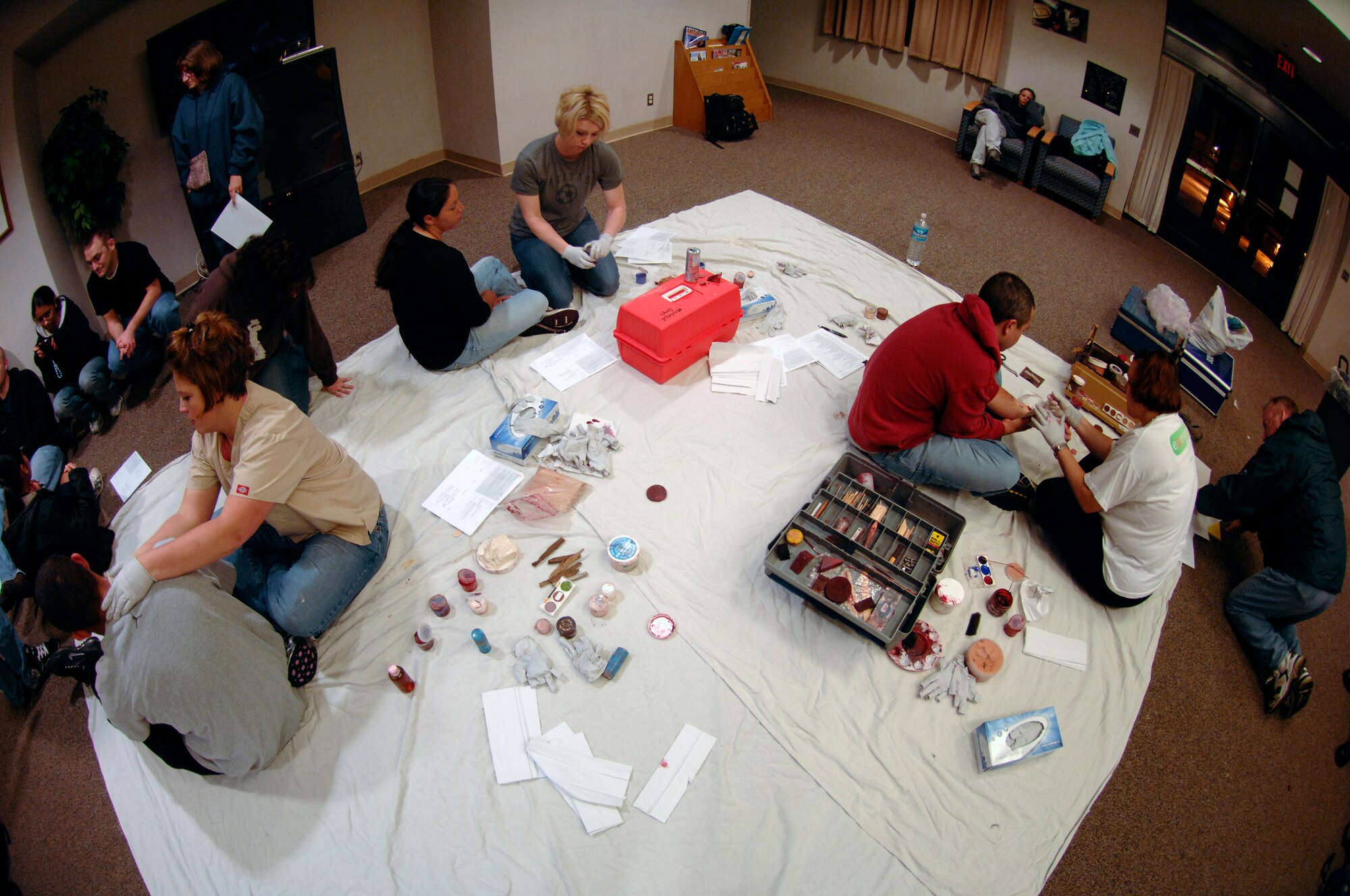 A moulage team prepares volunteers for a mock explosion scenario during the Capital Shield Exercise Oct.28.  Having moulage victims helps to create a more realistic scenario for first responders and medical personnel in preparation for a real world catastrophic situation. The exercise consisted of multiple scenarios including suspicious packages, mass casualty training, and terrorist attack procedures. Capital Shield is an annual exercise in the National Capital Region involving civilian and military authorities such as 316th Wing, 779th Medical Group, 89th Airlift Wing, Prince George’s County Fire and Police Departments and Maryland State Police. (U.S. Air Force photo by Senior Airman Steven Doty)