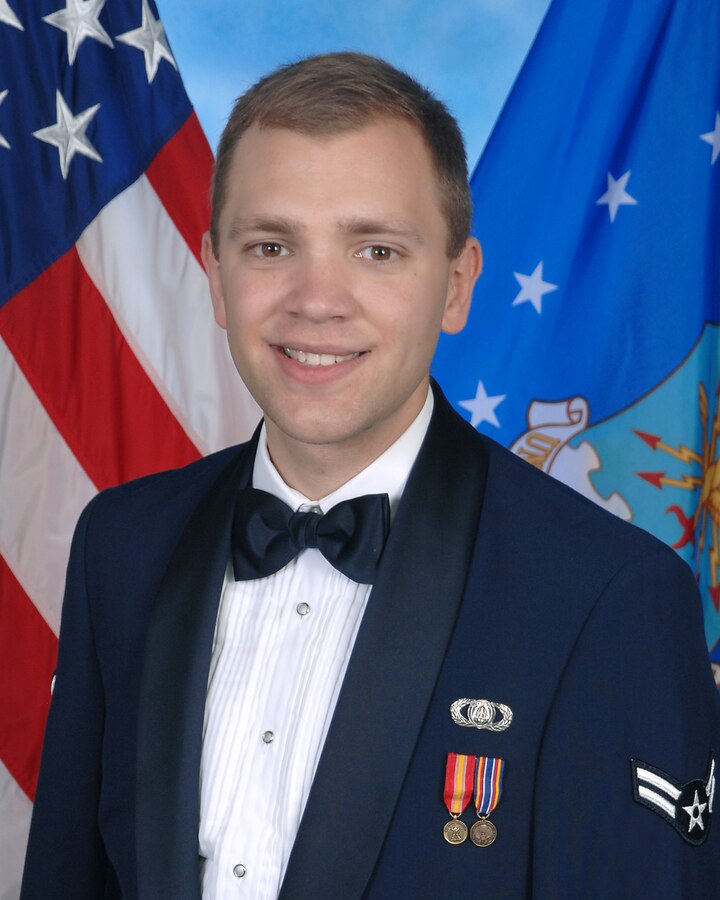 Airman First Class Michael J. Srstka performs on piano with the USAF Heartland of America Band.  He will be soloing with the Concert Band during the group's eight-day tour of South Dakota and northwest Iowa, including a performance on Veteran's day in his home town of Sioux Falls.