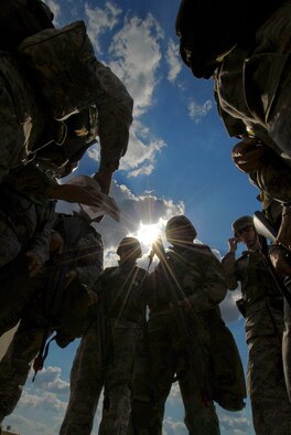 Airmen gather for a briefing at Blue Thunder during an exercise Oct. 3 to prepare to deployment operations. (Air Force photo by Jamie Pitcher)