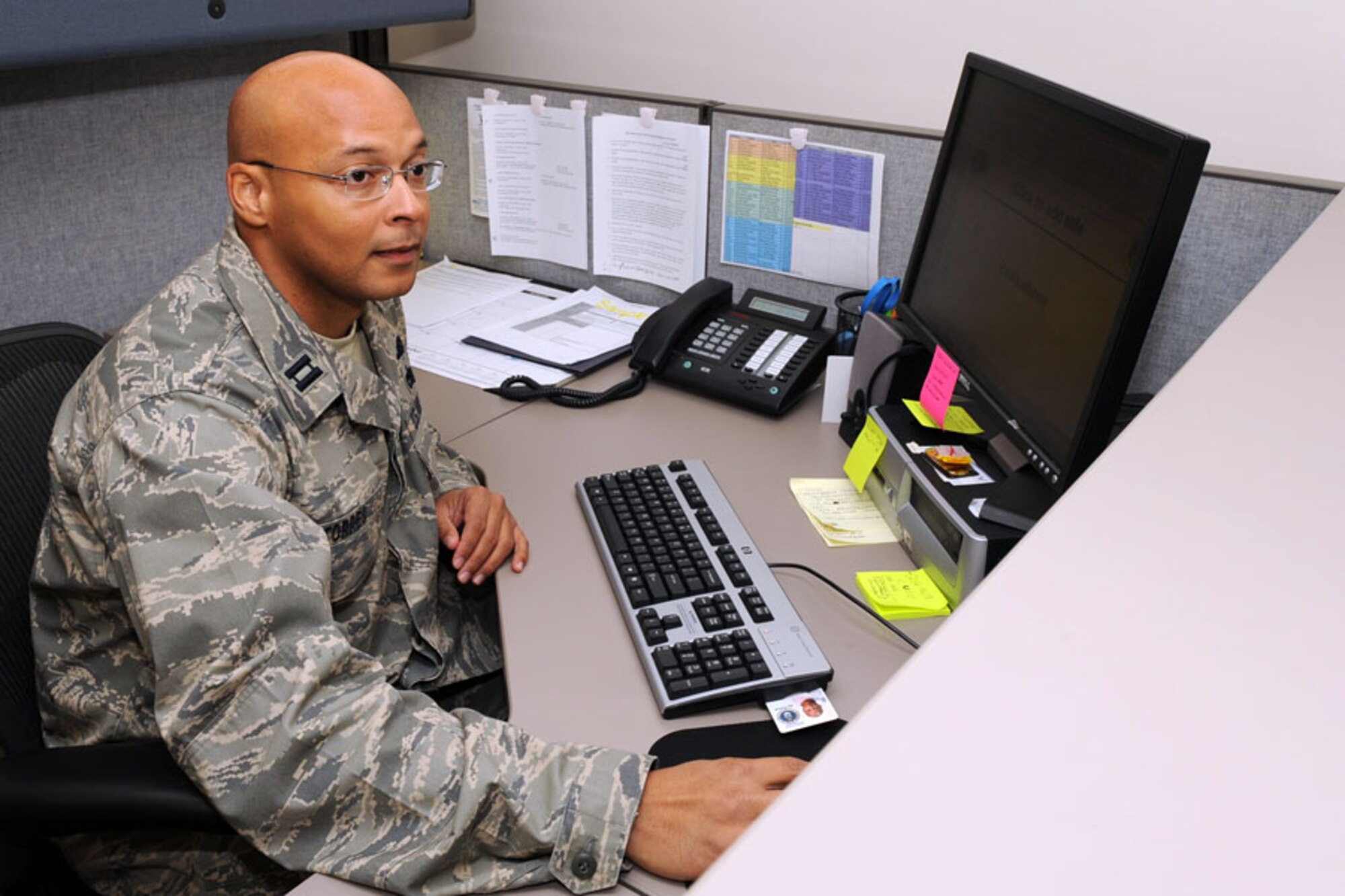 SCOTT AIR FORCE BASE, Ill. -- Capt. Edward Torres, 635th Supply Chain Management executive officer, was featured in the Chief of Staff of the Air Force’s Portraits in Courage-Airmen in the Fight, Volume III. While then 1st Lt. Torres was in Iraq he successfully got his troop through two consecutive Improvised Explosive Device attacks. Captain Torres and 15 other Airmen were chosen for showing bravery, commitment, teamwork and personal sacrifice while furthering the Air Force mission. 
(U.S. Air Force photo/Senior Airman Jonathan Lovelady)
