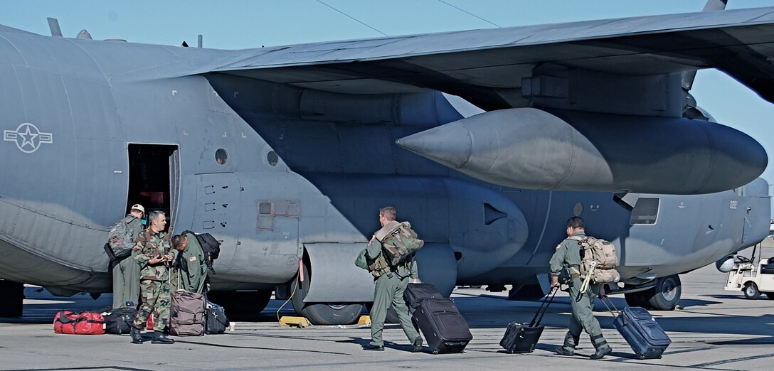 Approximately 60 Airman from the 129th Rescue Wing depart Moffett Federal Airfield Monday, Sep. 1 in support of hurricane relief off of the Gulf of Mexico.  Airmen boarded an MC-130P Combat Shadow tanker Monday morning en route to Texas where they will wait until the storm passes before arriving to any hot spots following the storm's surge on land. (U.S. Air Force photo by Staff Sgt. Jill Jamgochian) 