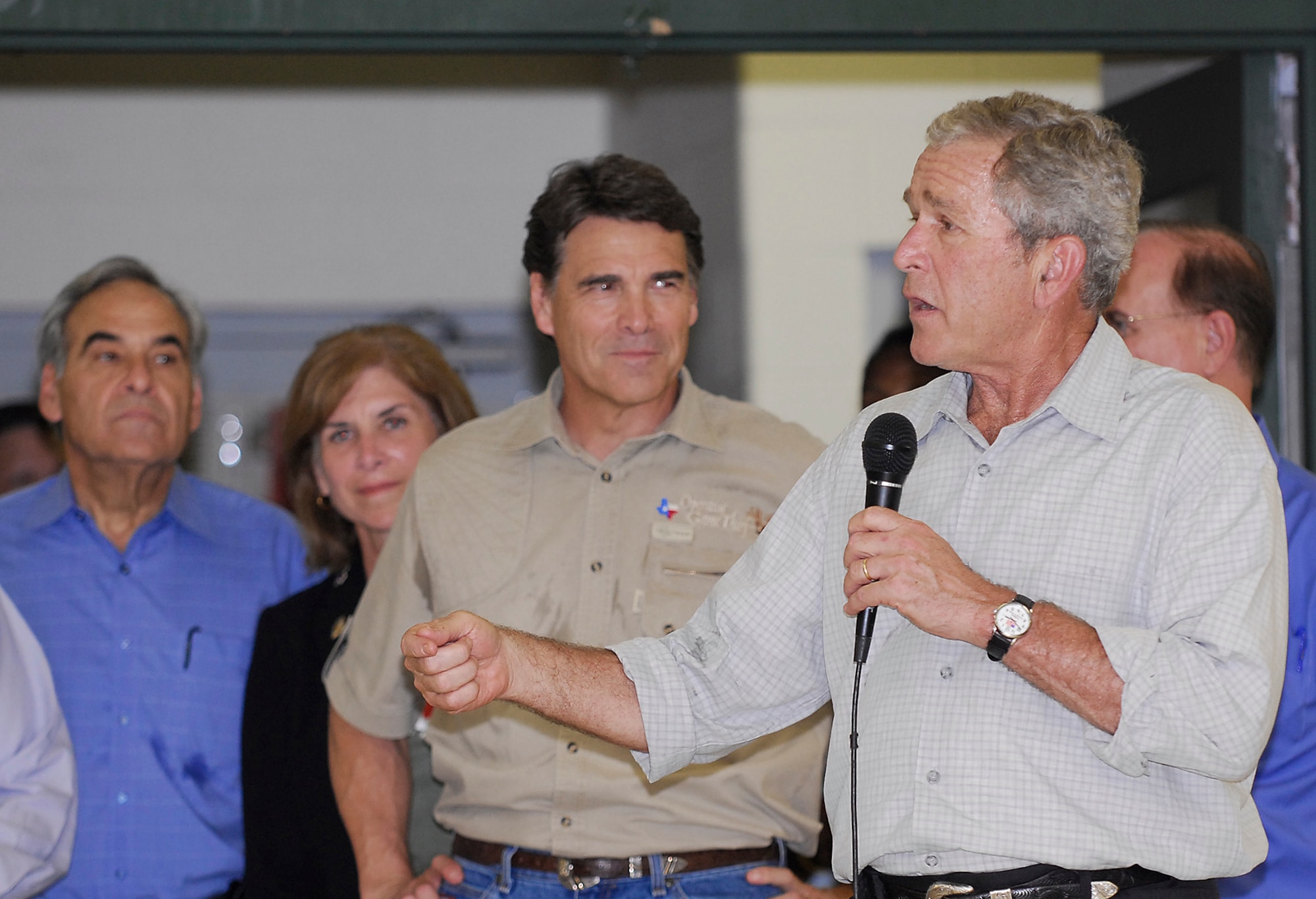 President George W.Bush along with Texas Gov. Rick Perry take a moment to personally thank Hurricane Gustav relief workers and meet evacuees during a visit to Port  San Antonio, Texas Sept.1.  
(U.S. Air Force photo/Staff Sgt. Andre Bullard)