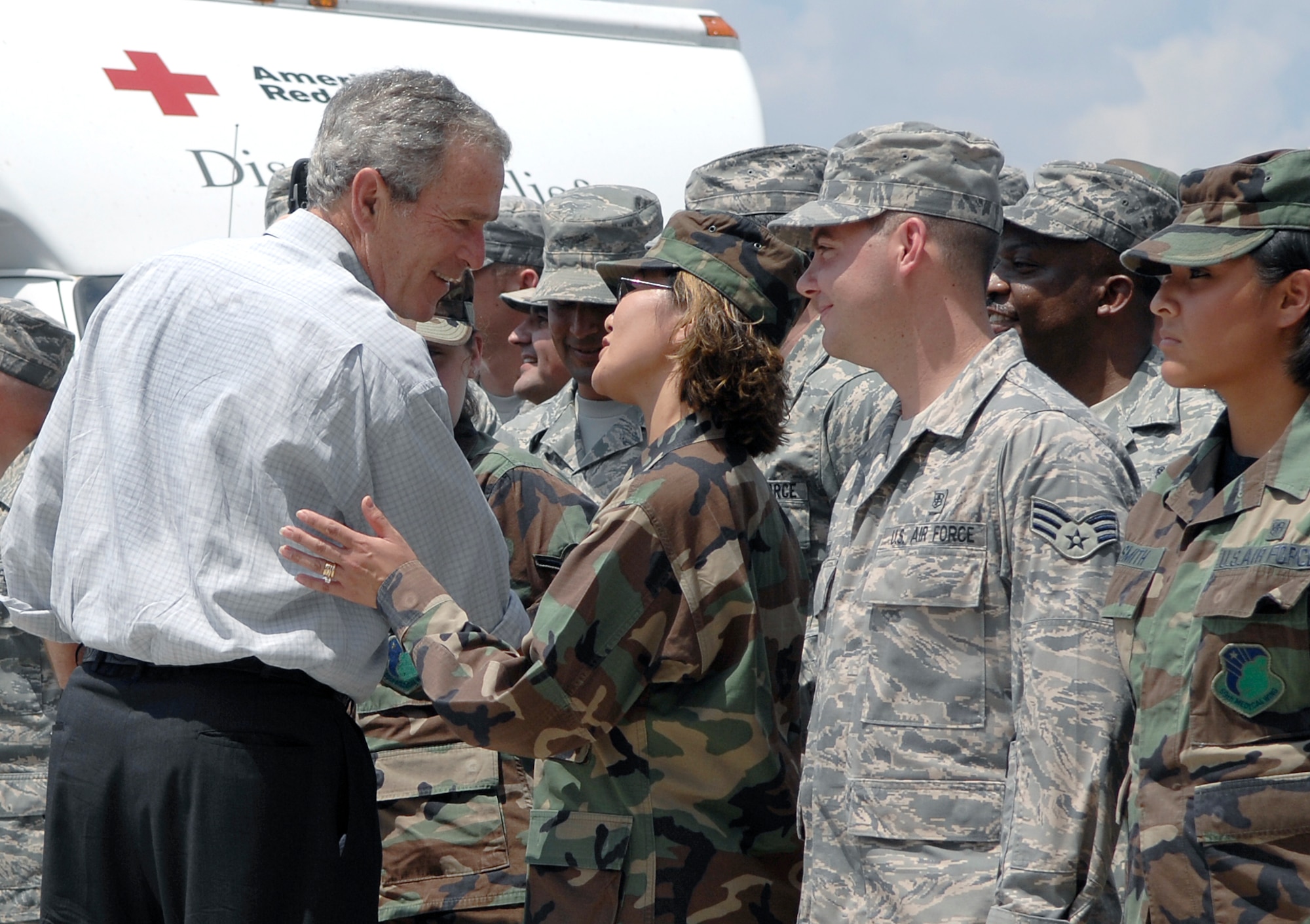 President George W. Bush personally thanks Airman of the Texas Air National Guard 149th Fighter Wing and the 59th Medical Wing for their volunteer efforts in processing over 700 evacuees displaced due to Hurricane Gustav Sept.1 at Port San Antonio, Texas. 
(U.S. Air Force photo/Staff Sgt. Bennie J. Davis III)