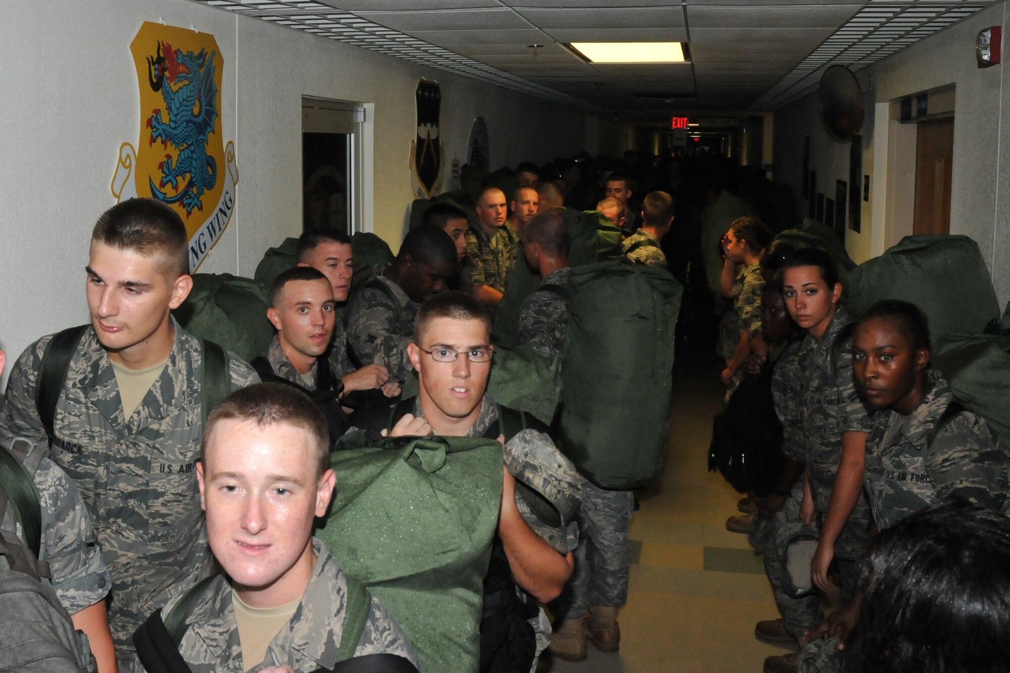 Non-prior service technical training students arrive from around Keesler to a designated shelter located at Wolfe Hall.  The students were among more than 750 Keesler personnel sheltering at Wolfe Hall, just one of the shelters open on base (U.S. Air Force photo by Adam Bond).