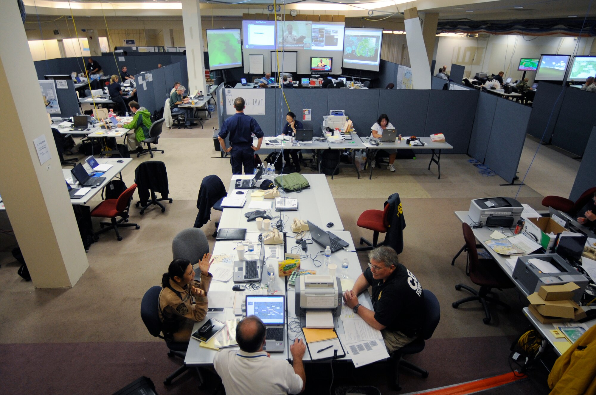Officials with the Federal Emergency Management Agency and the Department of Defense along with emergency personnel track Hurricane Gustav's path and conduct relief operations Sept. 1 from the Hurricane Gustav Joint Field Office in Baton Rouge, La.  (U.S. Air Force photo/Staff Sgt. Shawn Weismiller)