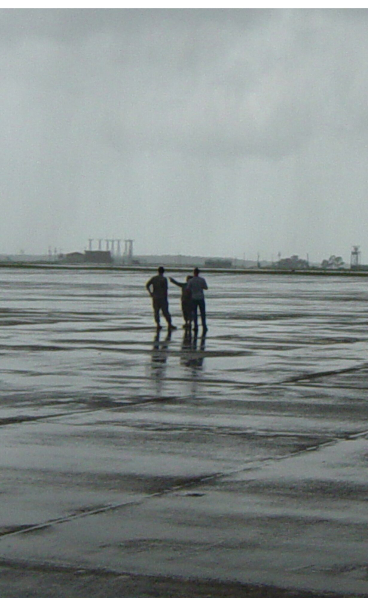 EGLIN AIR FORCE BASE, Fla. -- Weather observers from the 46th Weather Squadron observe the skies for funnel clouds Sept. 1 here. Eglin experienced seven tornadic events because of the base's location near the fringe of Hurrican Gustav. (Courtesy photo)
