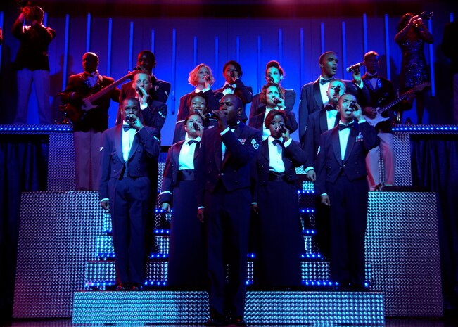 Members of the Air Force Expeditionary Entertainment Team "Tops in Blue" sing the Airmen's Creed as their closing number at the Charleston Performing Arts Center Aug. 30. Since its first world tour in 1953, the group has performed on film, produced albums and appeared on national television with such legends as Ed Sullivan, Bob Hope, Alabama, Barbara Mandrell, Boyz II Men and many others. (U.S. Air Force photo/Airman 1st Class Timothy Taylor)