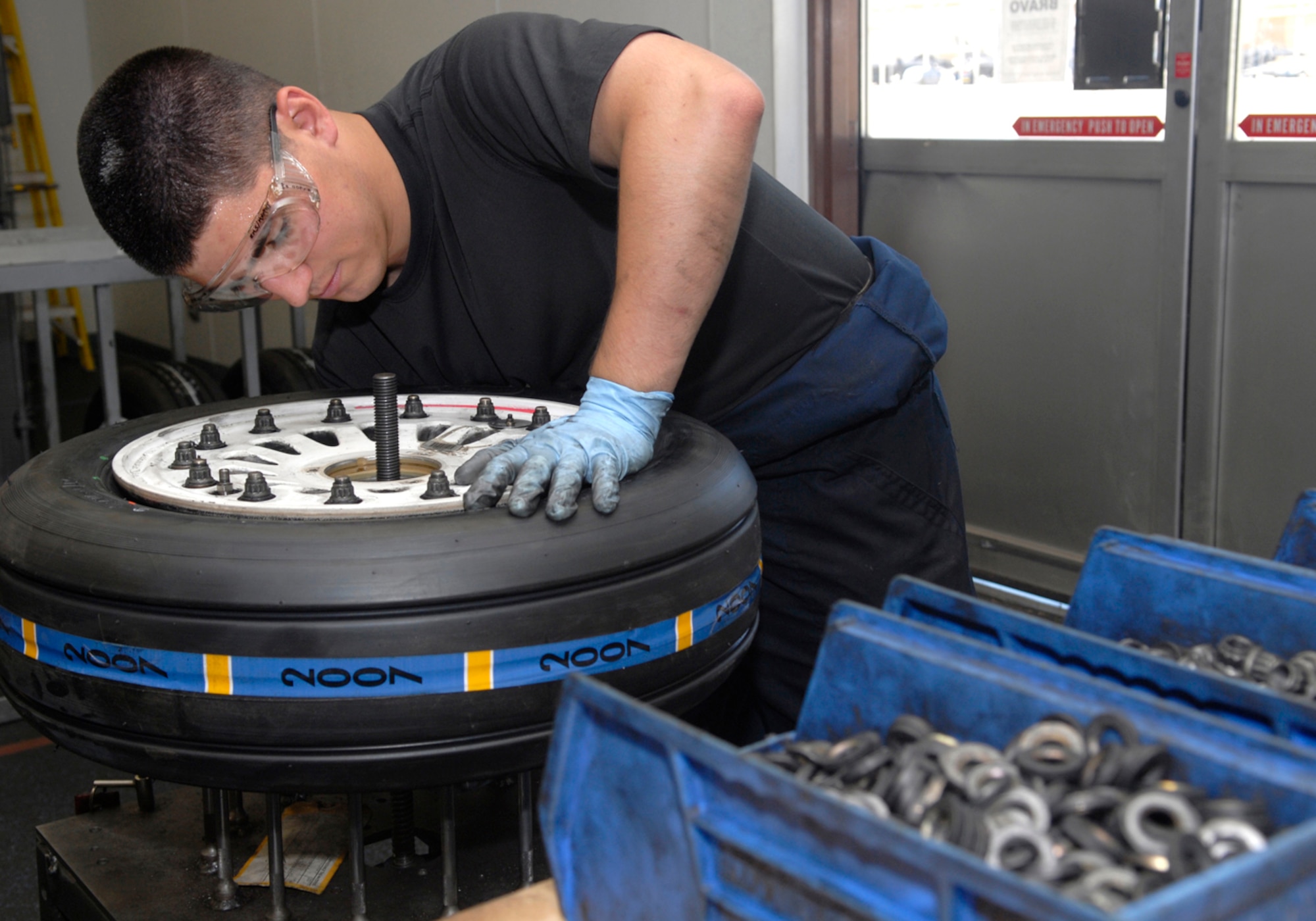 Airman 1st Class Austen Hitchcock, 56th Equipment Maintenance Squadron Wheel and Tire Shop technician, assembles a block-32 wheel. The shop is a role model of what a wheel and tire shop could be by applying AFSO 21 principles.