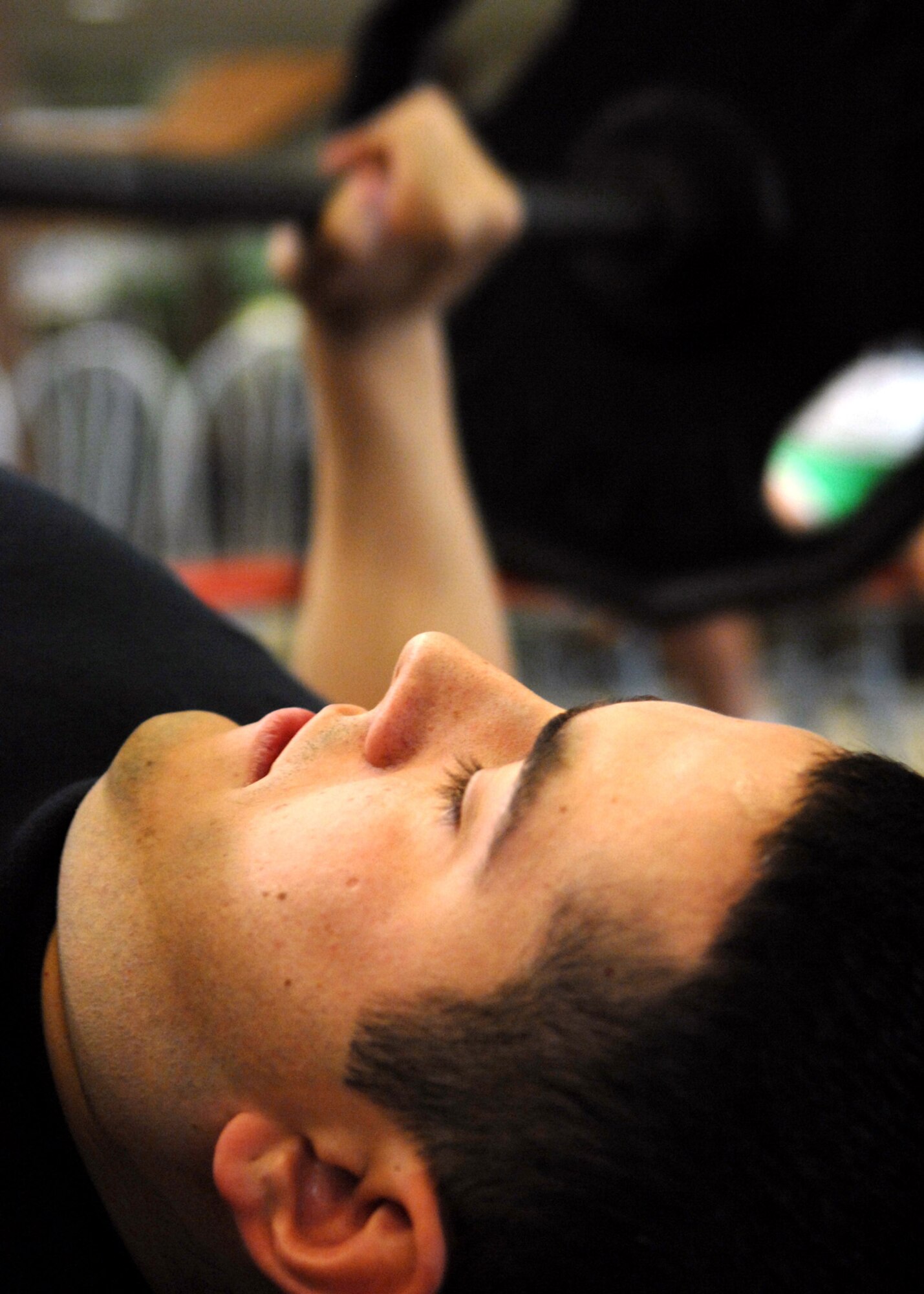 Senior Airman Anthony Hayner, 49th Medical Group, does 40 bench press repetitions during the Iron Airman Challenge at Holloman Air Force Base, N.M., Aug. 27. Airman Hayner competed with a team of five others. (U.S. Air Force photo/ Senior Airman Anthony Nelson Jr)