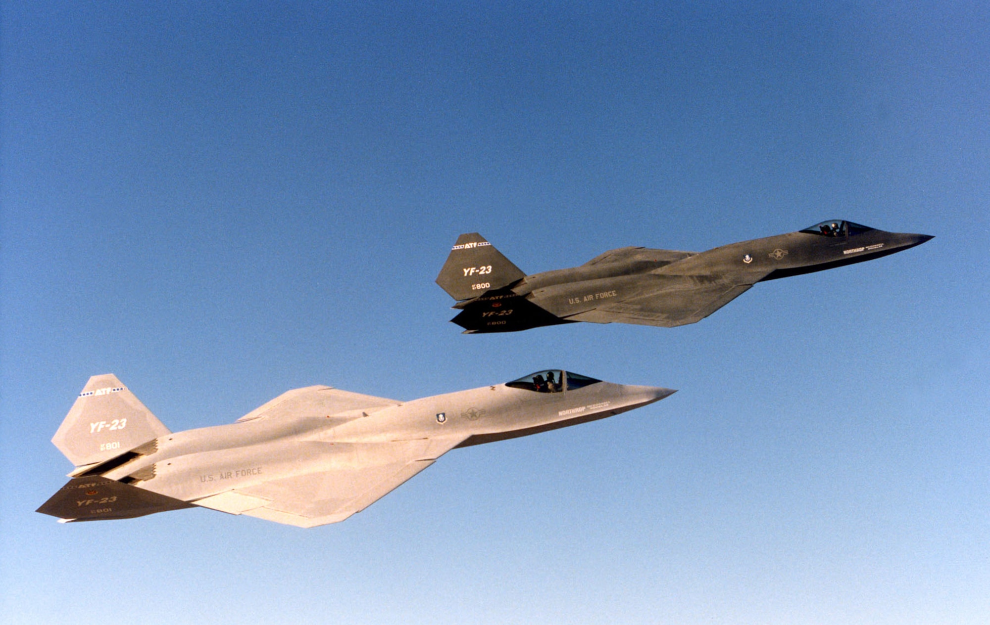 The two Northrop-McDonnell Douglas YF-23 prototypes in flight. The aircraft on display at the National Museum of the United States Air Force is the darker one on the right. (U.S. Air Force photo)