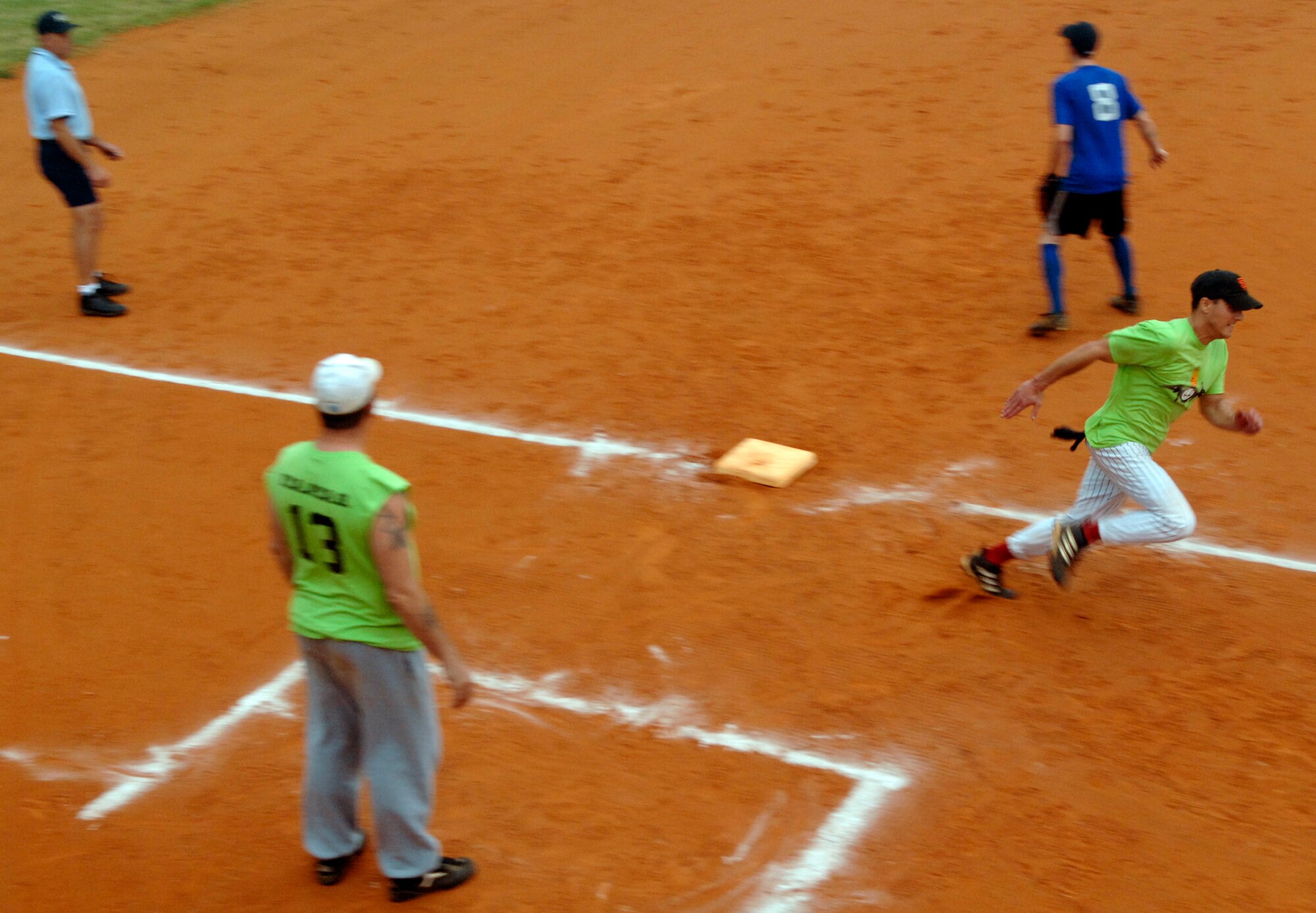 LANGLEY AIR FORCE BASE, Va. -- Senior Airman George Fontana, 1st Equipment Maintenance Squadron sprints home during the softball championship game Aug. 28.  The 1st CS handed 1st EMS its first loss of the year, 18-15, in the finale. (U.S. Air Force photo/Senior Airman Vernon Young)