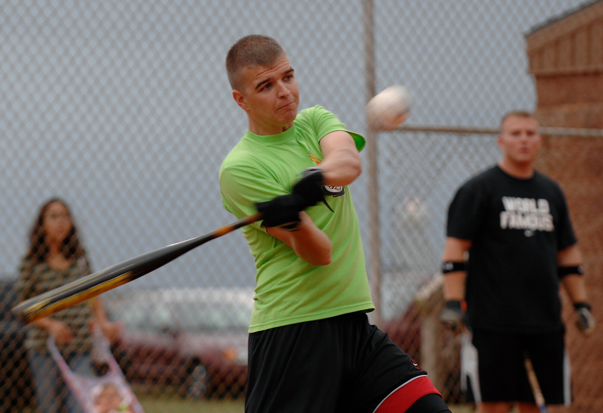 LANGLEY AIR FORCE BASE, Va. -- 2nd Lieutenant Keith Myer, 1st Equipment Maintenance Squadron, takes a swing during the softball championship game against the 1st Communications Squadron, Aug. 28.  The 1st CS handed 1st EMS its first loss of the year, 18-15, in the finale. (U.S. Air Force photo/Senior Airman Vernon Young)