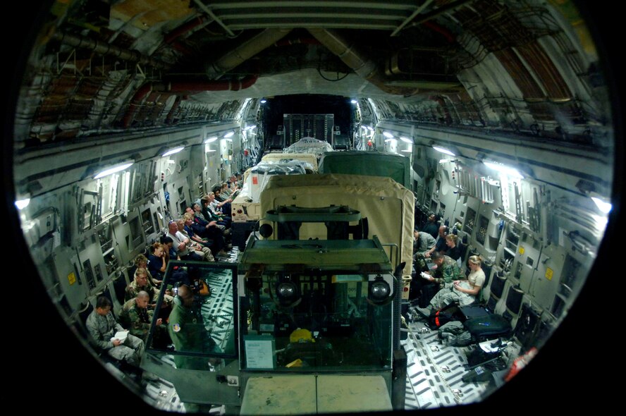 On a C-17 Globemaster III en route to Altus Air Force Base, Okla., members of the 6th Medical Group Mobile Aeromedical Staging Facility team from MacDill Air Force Base, Fla., plan for post-hurricane operations.  The team deployed to Beaumont, Texas, to assist in Hurricane Gustav evacuations.  (U.S. Air Force photo by Staff Sergeant Joseph L. Swafford Jr.)