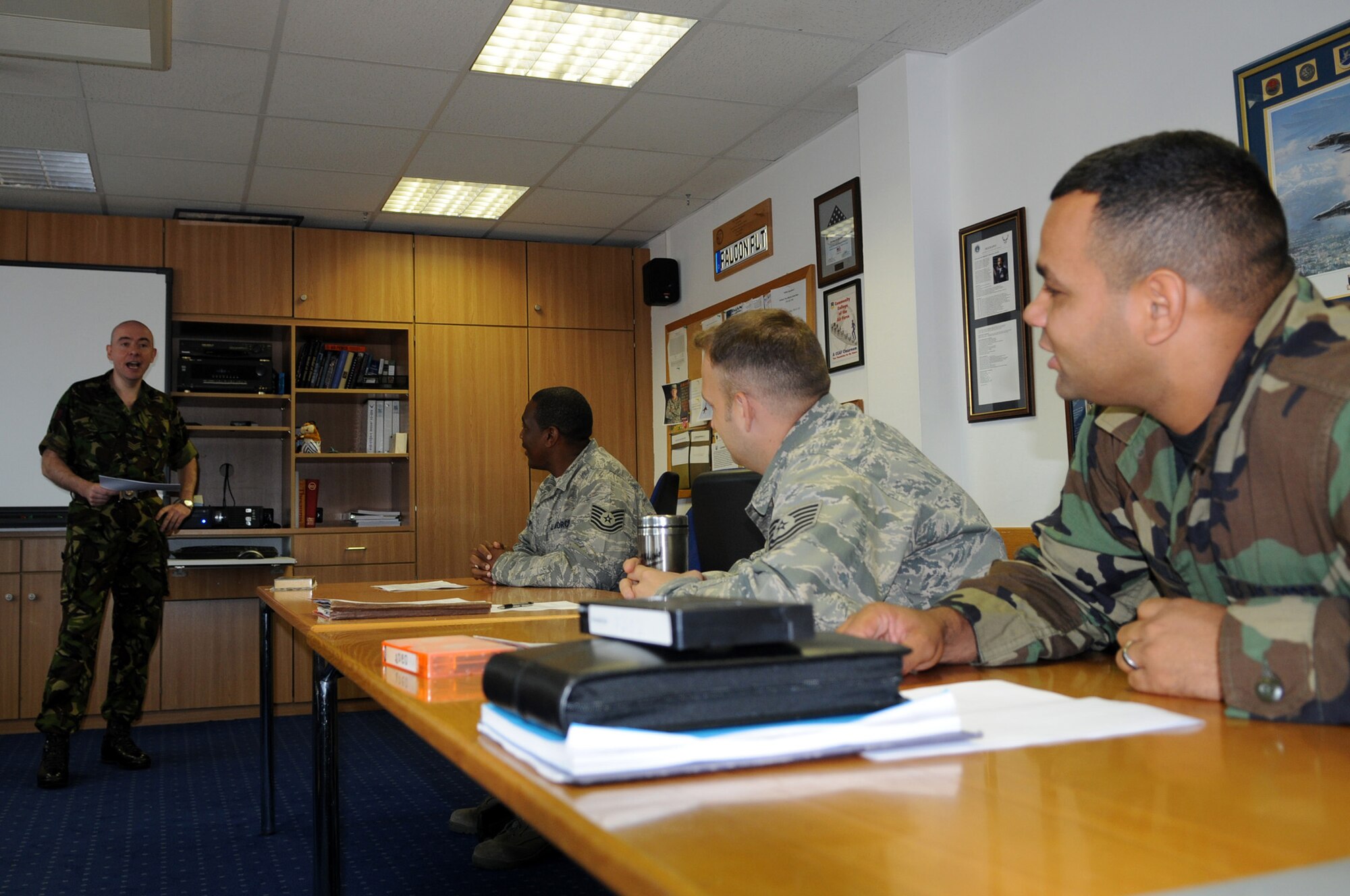 Royal Air Force Sgt. David Madin (left), presents a speech to his classmates while attending the Kisling NCO Academy on Kapaun Air Station, Germany, Aug. 26, 2008. Sgt. Madin is the first member of the RAF to attend the Kisling NCO academy since 1992. (U.S. Air Force photo by Senior Airman Kelly LeGuillon)(Released)