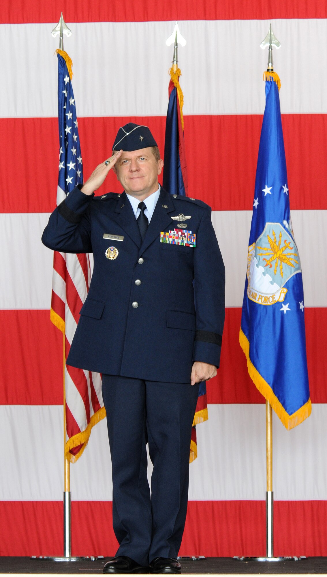 ANDERSEN AIR FORCE BASE, Guam - Brigadier Gen. Philip Ruhlman renders his first salute to his new Airmen Sept. 2 here. General Ruhlman has been in the Air Forrce for 28 years and has been stationed throughout the Pacific area of responsibility.  (U.S. Air Force by Airman 1st Class Courtney Witt)