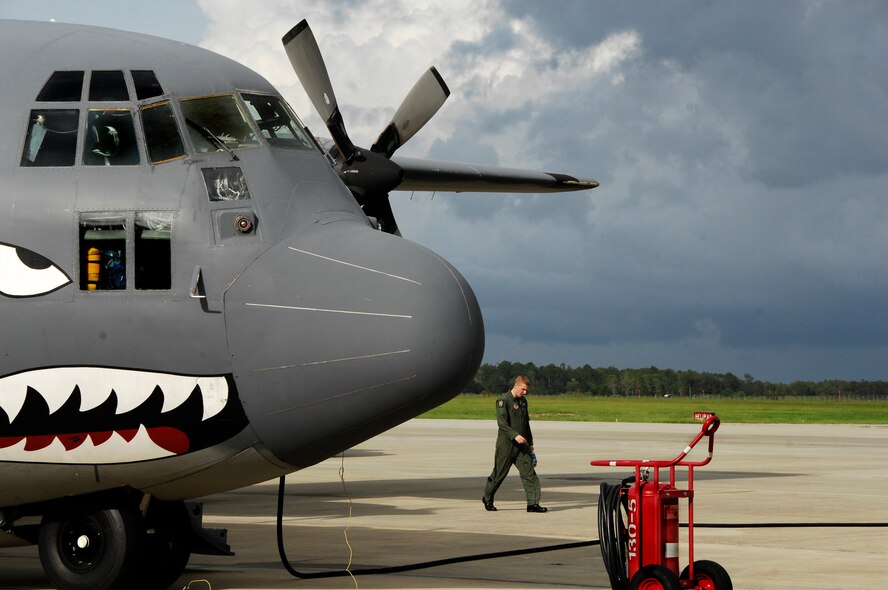 MOODY AIR FORCE BASE, Ga. -- Senior Airman Geoff Koppel, 71st rescue Squadron loadmaster, walks around a 71st RQS C-130E Hercules before a scheduled mission to deliver a Rescue Operations Center to Jackson, Miss. after Hurricane Gustaf made landfall Sept. 1.  The mission was not needed and the equipment has been placed back on ready-alert status for the next storm response.  (U.S. Air Force photo by Tech. Sgt. Parker Gyokeres)