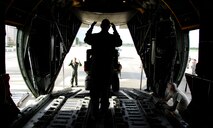 MOODY AIR FORCE BASE, Ga. -- A loadmaster with the 71st Rescue Squadron guides an all-terrain vehicle onto a 71st RQS C-130E Hercules here Sept. 1. The vehicle was a part of the 23rd Wing's response to aid victims of Hurricane Gustav. (U.S. Air Force photo by Tech. Sgt. Parker Gyokeres) 