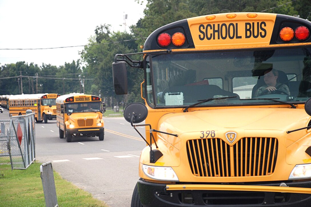Members of the Louisiana National Guard drive school buses to different evacuation sites throughout the state to assist with hurricane operations, Aug. 31, 2008. 