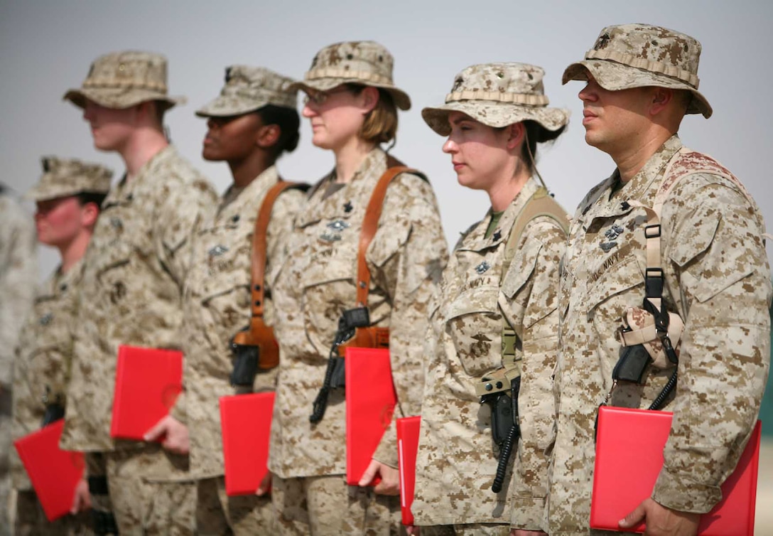 Six Navy air traffic controllers with Marine Wing Control Squadron 1 recently earned their Fleet Marine Force Warfare Specialist badges, becoming part of an elite group of controllers. Approximately 15 percent of the more than 2,500 Navy ATCs have FMF badges. Navy controllers rarely find themselves attached to Marine units as often as corpsmen and supply technicians, according to Master Chief Petty Officer Jeff Brown, who manages personnel assignments for all Navy controllers at Navy Personnel Command, Millington, Tenn. (U.S. Marine Corps Photo / Released)