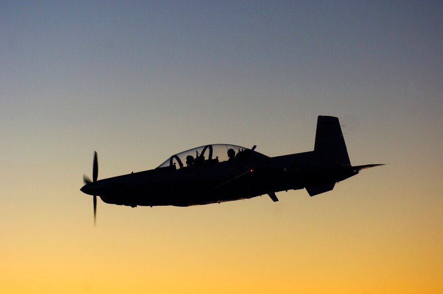 With no power and the propeller grinding, Currie glided his T-6 in for a successful emergency landing at Randolph AFB, Texas. (photo by Tech. Sgt. Matthew Hannen)