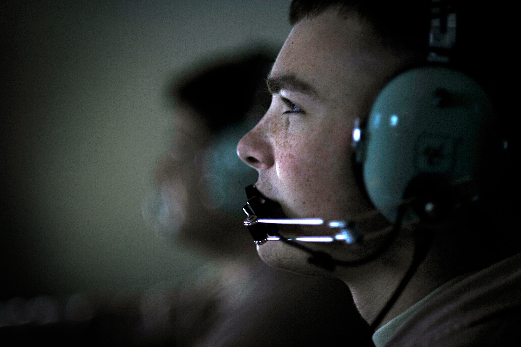 Airman 1st Class Edmond Lipinski tracks suspected movements on radar during a E-8C Joint STARS mission over Iraq Sept. 1.  The flight marked 40,000 combat hours supporting the war on terrorism for the deployed Airmen of the 116th Air Control Wing.  The E-8C Joint Surveillance Target Attack Radar System is assigned to the 7th Expeditionary Air Combat and Control Squadron at an air base in Southwest Asia.(U.S. Air Force photo/Staff Sgt. Aaron Allmon II)