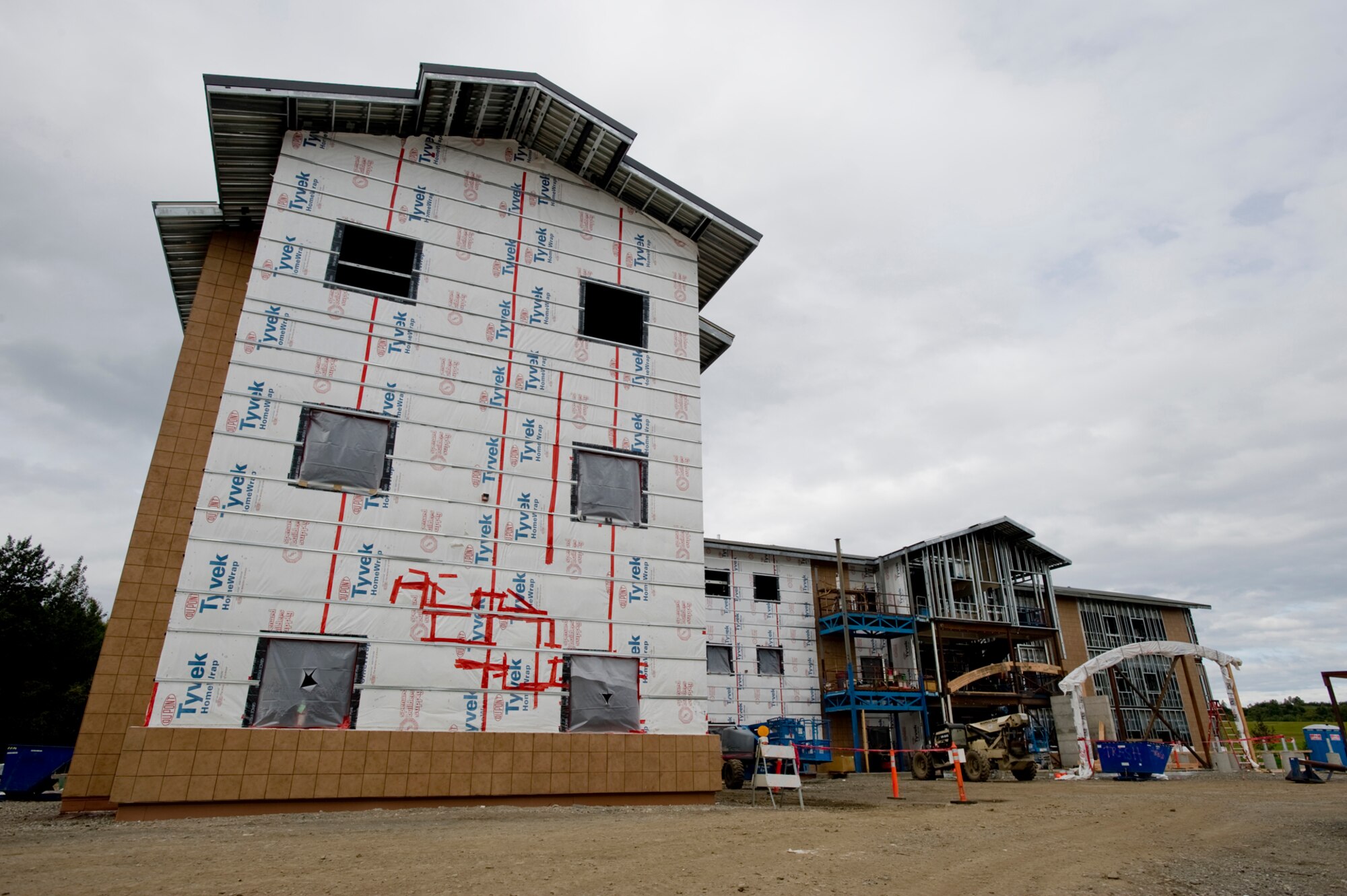 ELMENDORF AIR FORCE BASE, Alaska -- The new dormitory starts to take form as construction continues. More than 25 different sub-contracted companies are working together to ensure the dorm is completed in a timely and efficient manner.  (U.S. Air Force photo/Staff Sgt. Joshua Garcia)