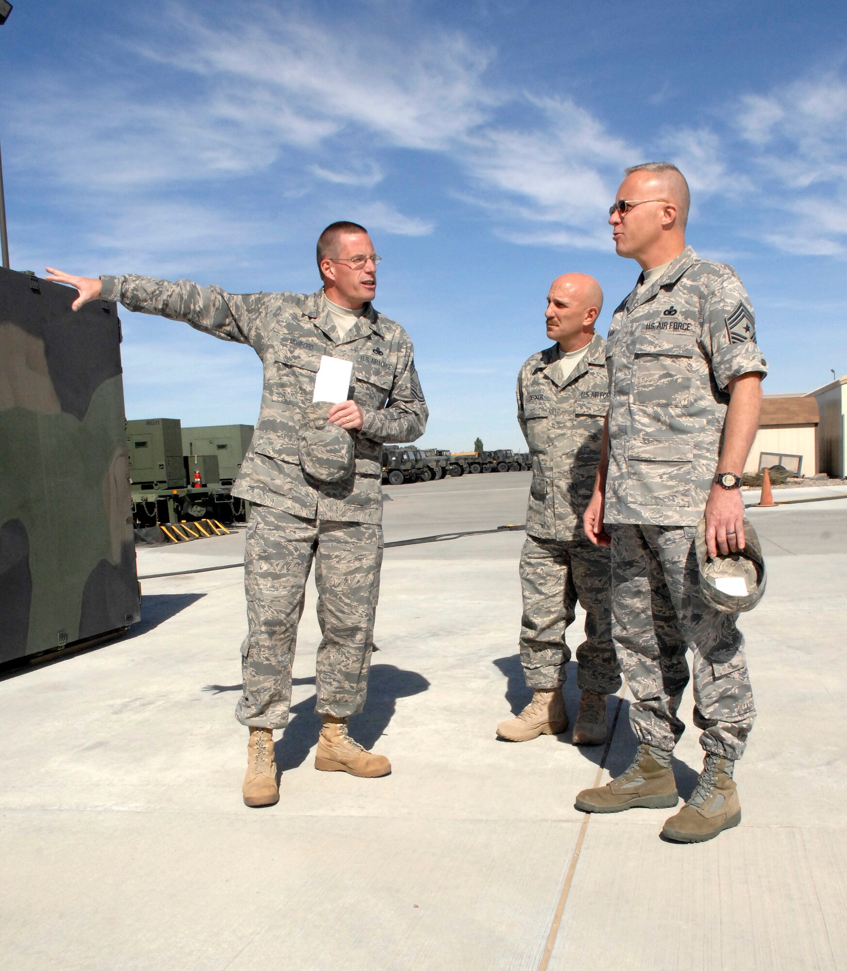 MOUNTAIN HOME AIR FORCE BASE, Idaho -- Chief Master Sgt. David Mumford, 726th Air Control Squadron maintenance chief, shows Chief Master Sgt. Todd Kabalan (right), 8th Air Force command chief, some of the maintenance areas of the 726th ACS compound. The 726th ACS now falls under the 8th AF and this was the first time Chief Kabalan visited Mountain Home Air Force Base. (U.S. Air Force photo/ Airman Deborah Young)