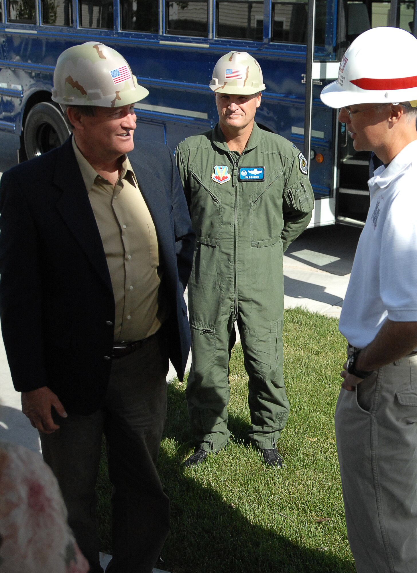MOUNTAIN HOME AIR FORCE BASE, Idaho - Senator Mike Crapo talks to Mark Slominski, Army Corps of Engineers resident engineer, front of a new base house in the new base housing development while Col. James Browne, 366th Fighter Wing commander, looks on Aug. 27. (U.S. Air Force photo/ Airman 1st Class Stephany Miller)