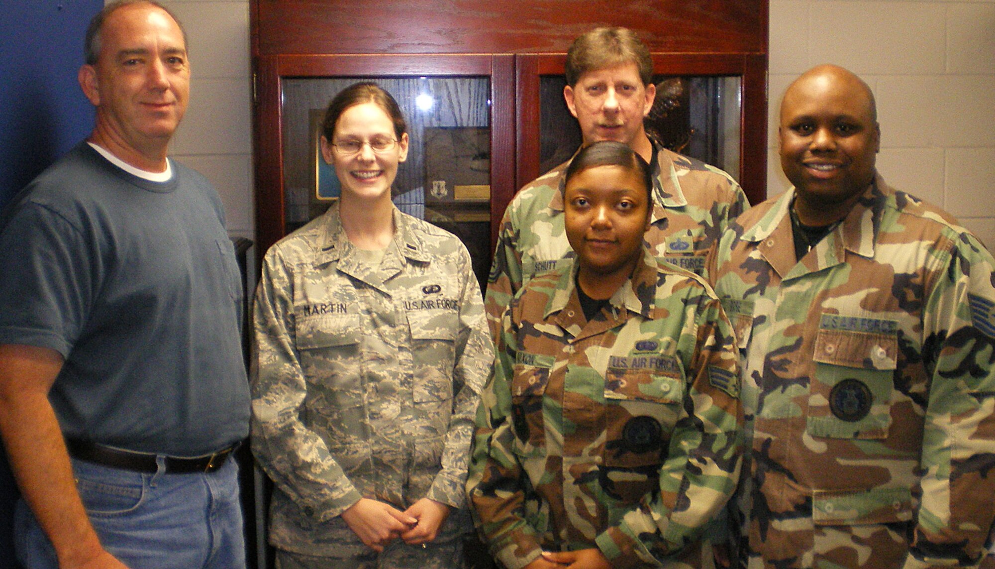 Members of the 331st Recruiting Squadron support flight worked through Labor Day weekend to ensure squadron members assigned to the New Orleans area were safe from Hurricane Gustav’s anticipated landfall Sept. 1. They are, from left to right, Dave Hall, 1st Lt. Margret Martin, Tech. Sgts. Mark Schutt and Trent Rose, and Senior Airman Shayla Nixon. (U.S. Air Force photo)