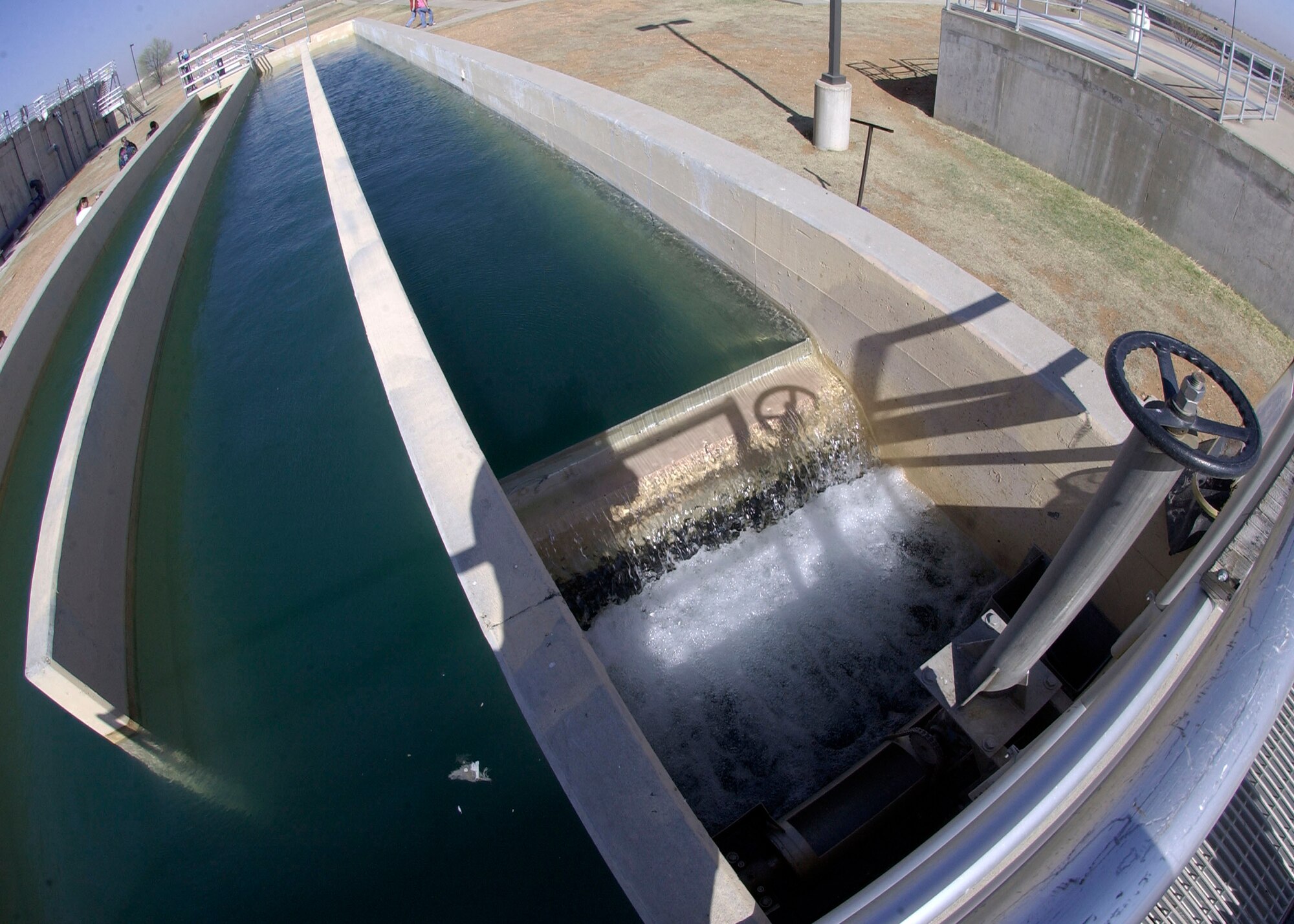 CANNON AIR FORCE BASE, N.M.-- At the 27th Special Operations Wing Waste Water Treatment Plant, water is being chlorinated and then released into the Playa Lake, Apr. 22. Before the water is discharged into the Playa Lake, it undergoes a chlorination process in the chlorine contact chamber. The chamber ejects water approximately every three hours, adding up to a total of 10 discharges per day. (U.S. Air Force photo/Airman Maynelinne De La Cruz)                               