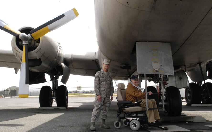 DOVER AIR FORCE BASE, Del. – Airman 1st Class Branden Holland, a first term airman with the 436th Aircraft Maintenance Squadron, escorts Bobby Massey, a veteran from the Delaware Veterans Home, for a tour at the Air Mobility Command Museum Aug. 26. Mr. Massey, a retired Air Force crew chief of 20 years, reminisced of old times with the aircraft he used to work on – the C-124 Globemaster II, referred to as ‘Old Shakey.’ (U.S. Air Force photo/ Airman 1st Class Shen-Chia Chu)