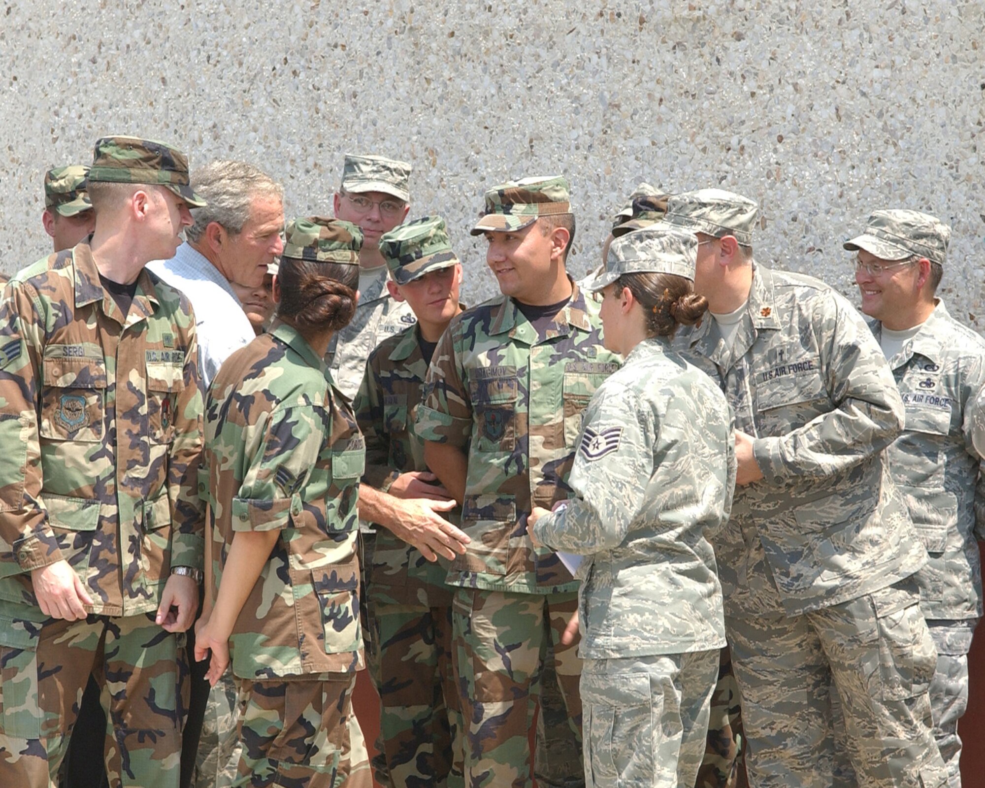 9/1/2008 - President George W. Bush personally thanks Lackland Airmen for their volunteer efforts in processing more than 700 evacuees displaced due to Hurricane Gustav Sept.1 at Kelly Field Annex, Lackland Air Force Base, Texas. (USAF photo by Alan Boedeker)                               