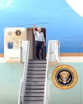 9/1/2008 - President George W. Bush waves as he exits Air Force One Sept. 1 at Lackland Air Force Base, Texas. The president visited San Antonio to be briefed on evacuation processes in response to Hurricane Gustav and to also personally thank Airmen responsible for the successful relief efforts. (USAF photo by Alan Boedeker)