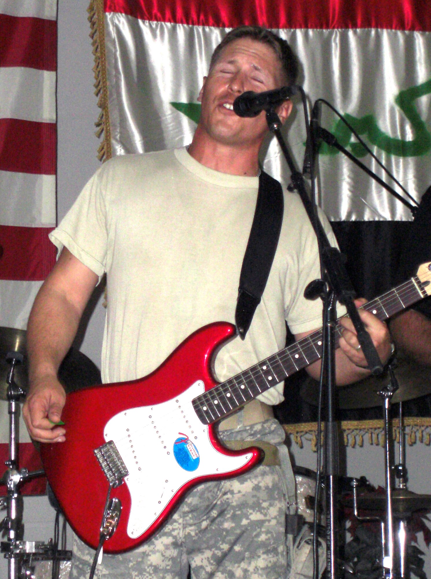 Army Spc. Andrew Walker, a Tennessee native, preforms for a joint audience with members of the Air Forces Central band Mirage in Mosul, Iraq recently. (Courtesy photo)
