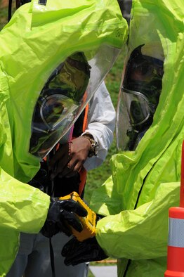 ANDERSEN AIR FORCE BASE, Guam - A member of the Guam National Guard's  Civil Support Team goes through a mock decontamination scenario with a multiray device during the CST's certification here August 25.  Certification is accomplished by the Army Element of U.S. Northern Command, in association with the Department of Homeland Security. (U.S. Air Force photo by Staff Sgt. Jamie Lessard)